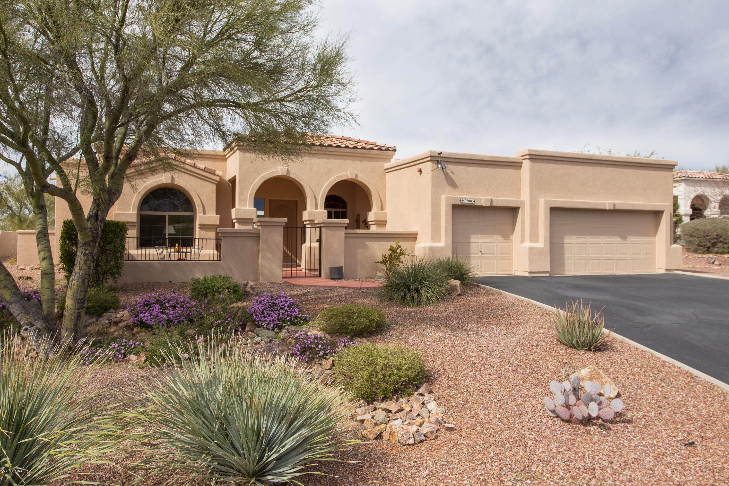 Fabulous Semi Custom Southwestern home on 1/2 acre with great mt. views, sunrise and sunsets. Gated Court Yard. Walk into lg entry hall with high ceilings, Living room, Formal Dining room, Chefs Kitchen with Granite Island and Countertops, plenty of Cabinets, Stainless Steel Appliances & a lovely Kitchen Nook. Great Room is spacious with Southwestern Fireplace. Large Master Suite, Luxurious Bath with 2 Vanities and Dressing Table. Huge Shower and Garden Tub. 2 Walk-In Closets, Split Bedroom plan with 2 good sized Bedrooms and a Full Bath. Guest Bathroom, Private Outdoor Patio, Resort like Backyard with Pool and Spa. View the Beautiful Sunsets and pleasant landscape. 3 Car Garage. Move in ready. Owner is licensed to sell Real Estate in AZ.