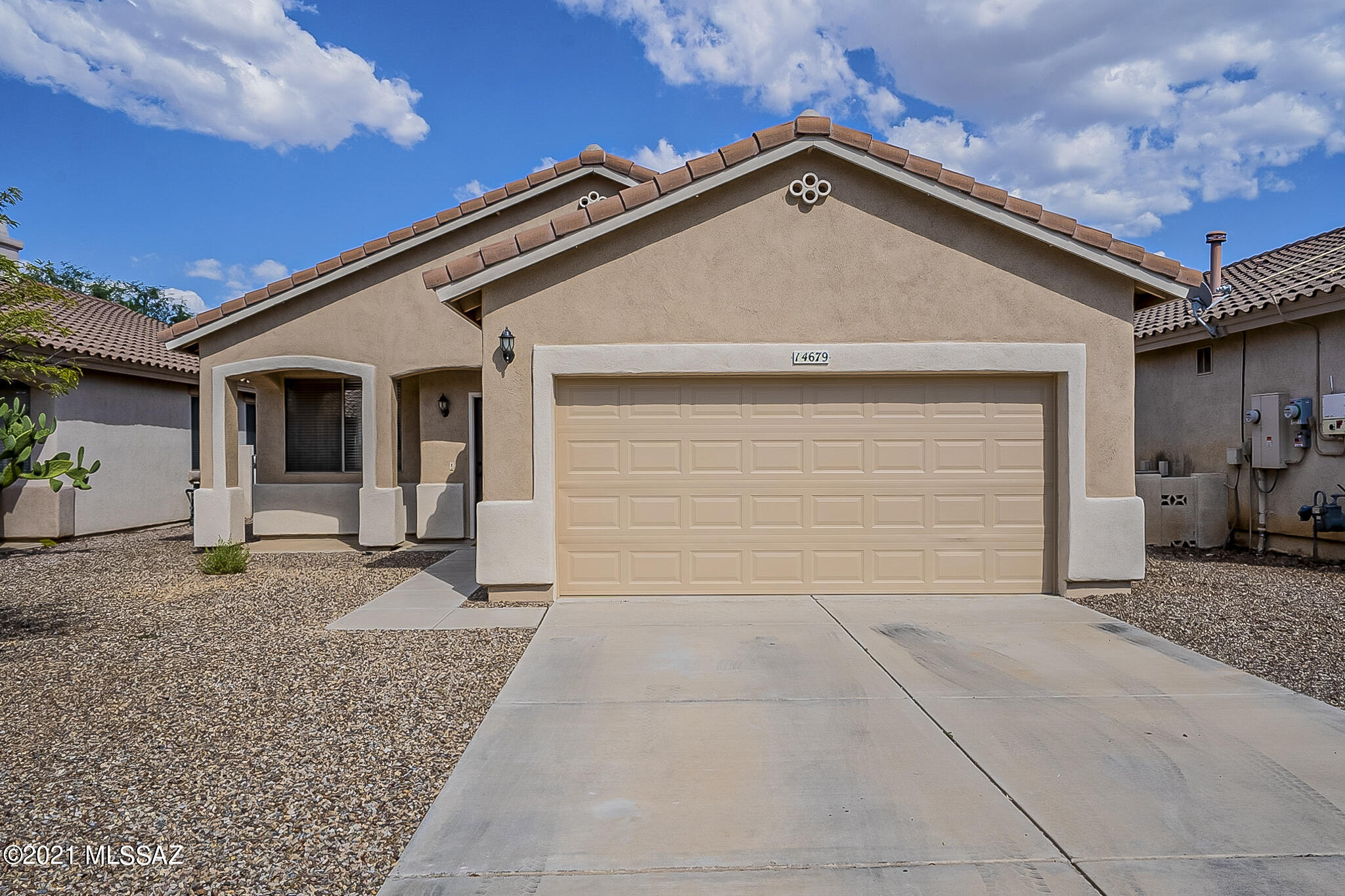Gorgeous 3 bed, 2 bath, 1580 sq ft home in master planned Rancho Sahuarita! As you walk into this home you will love the way this house welcomes you with it's high ceilings, you will love the way it sparkles with it's vinyl plank wood floors! You will find two spacious living areas, a fireplace, & a stunning kitchen with white cabinets. There are 3 bedrooms including a spacious master suite featuring a dual vanity in the bathroom, separate shower and tub and a huge walk in closet. This home doesn't stop there. Out back is a completely finished backyard with pavers, and artificial turf! You will love spending time in this space. If that all isn't enough for you, the Rancho Sahuarita community will be parks, lake, rec center, gym, pool, spa, and splash pad just to name a few of the amenities