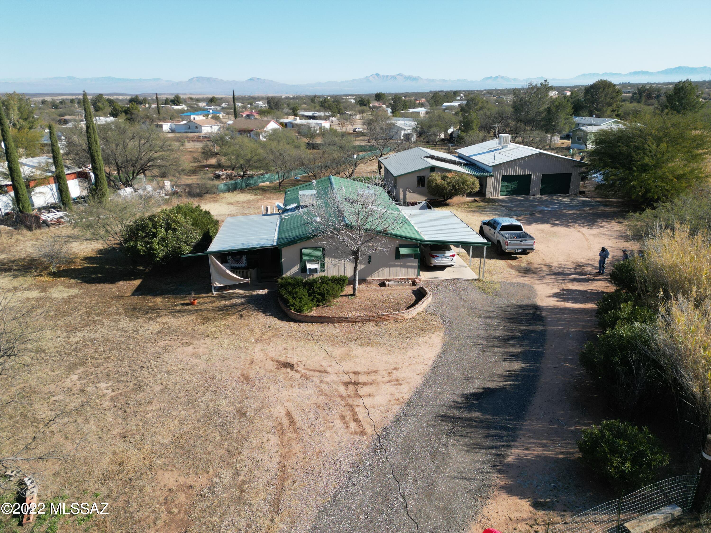 This is a property that would work for so many different opportunities. Perfect for a family of any size. Its a beautiful property with a great shop and a huge guest house. It has potential for rental income, airbnb, or use it as a mother-in-law suite. Guest house rental could help pay a portion of the mortgage. Its in a great neighborhood close to I-10 with quick access to tucson or Sierra vista. come see the opportunity for yourself!