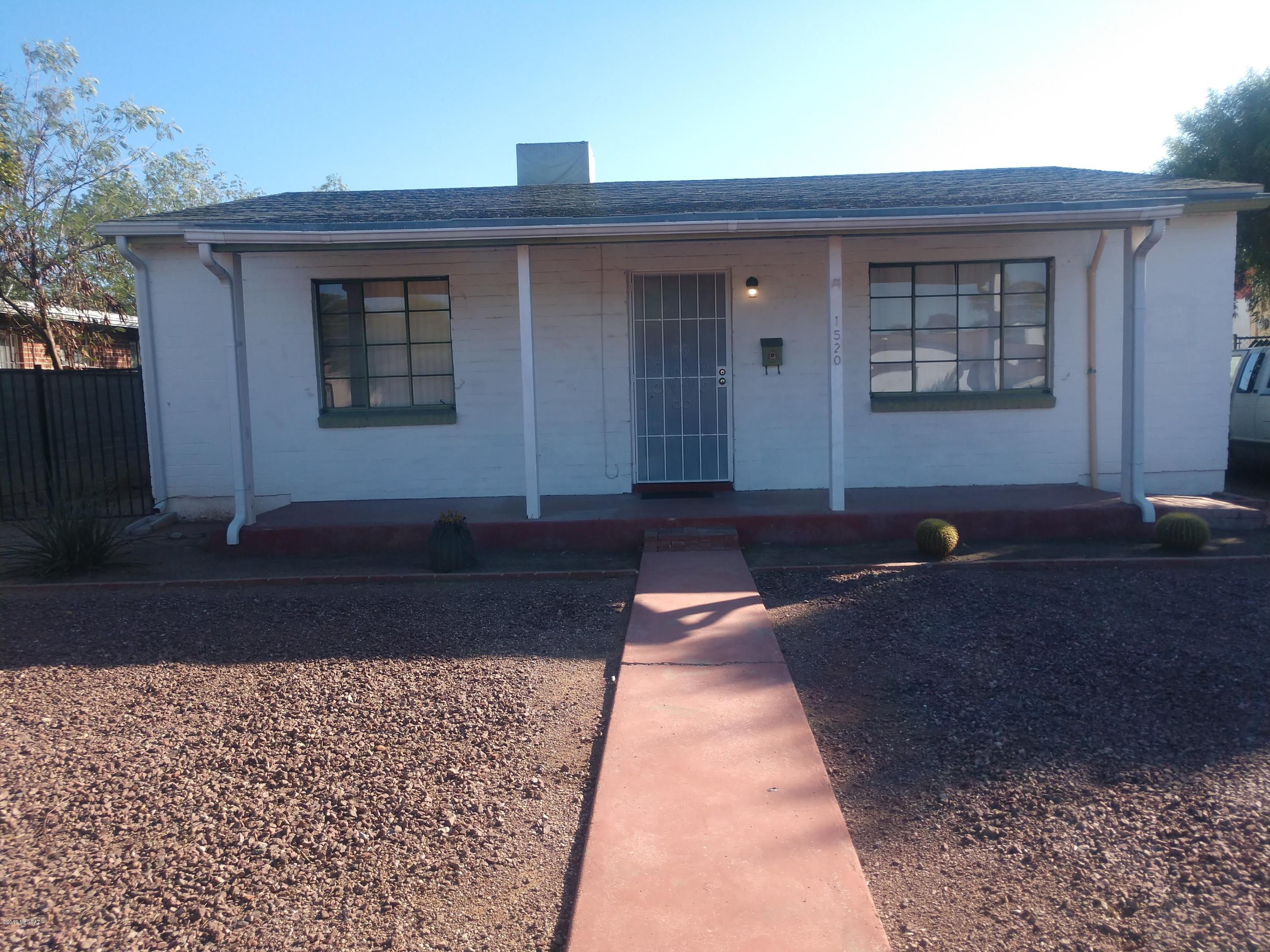 Charming 2 bed 2 bath bungalow with private yard, ceramic tile through out, freshly painted and washer dryer hookup. 
Gas stove, stainless refrigerator, Close to shops, restaurants, 
U Of A and more. Unit is AC Cooling, square footage includes enclosed area off kitchen. Call 
Angie Pena  520-331-1194