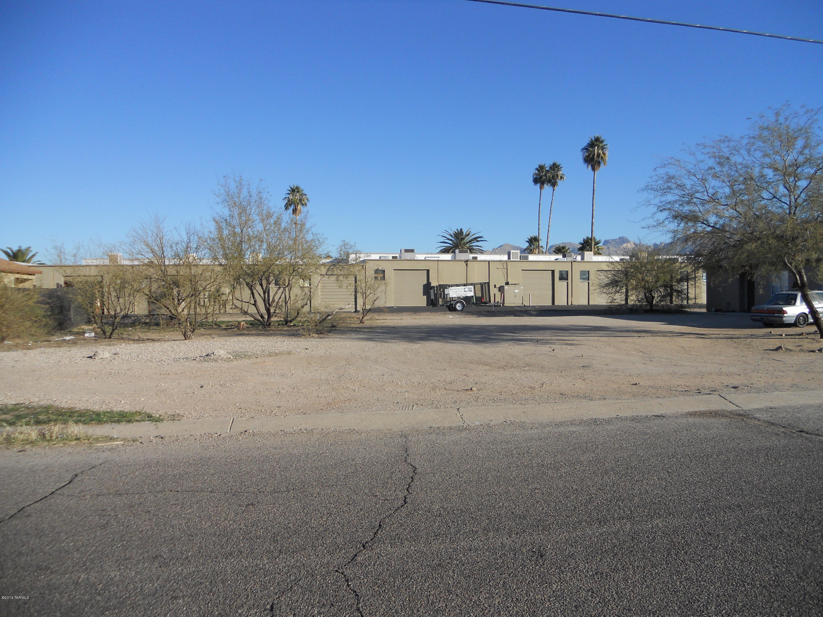 Rare C-1 lot in town. Flat and easily buildable with easy access to all of Tucson. All utilities at street including sewer. No deed restrictions on manufactured homes. Excellent lot for small commercial or duplex. Additional contiguous lot is also available.  Listing Agent is the manager of the LLC/Owner.
