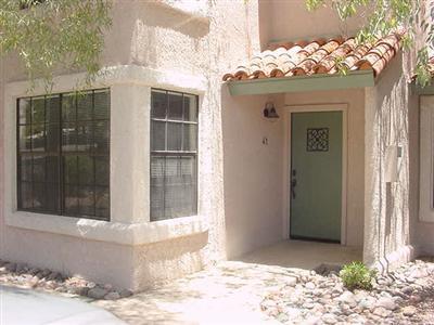 Bright 2 story townhome with vaulted ceilings and loads of amenities. Entire 2nd floor is devoted to master suite. 3rd bedroom can be converted to office or den. Very private patio backs up to a wooded area. All appliances included (washer & dryer too). Pets are negotiable (only small pet). You must see this gorgeous unit! Community pool & spa, tennis &  exercise facilities & rec center available.