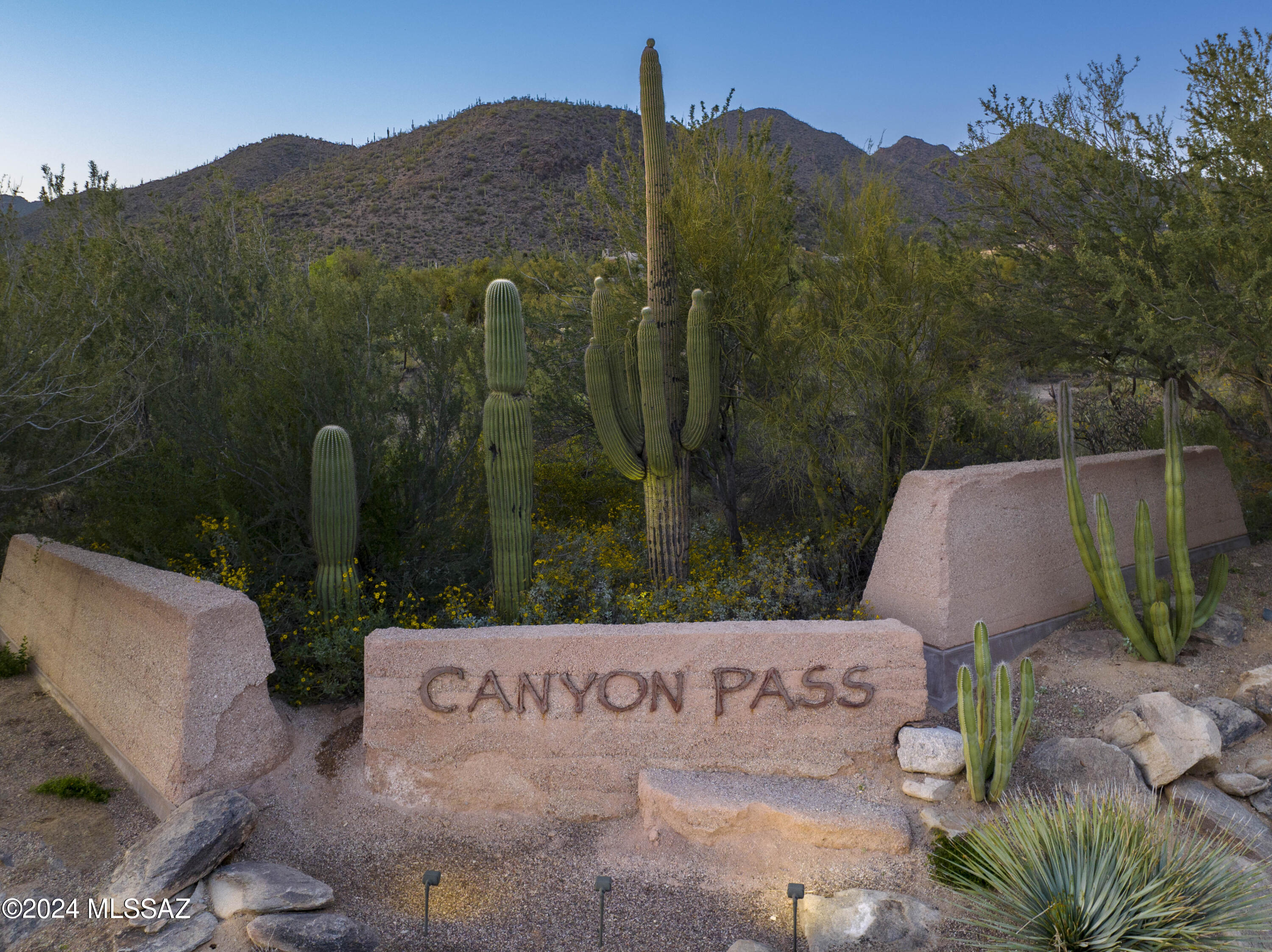 Gorgeous homesite within the exclusive Canyon Pass at Dove Mountain. Over 3 acres of complete privacy with stunning mountain and canyon views.