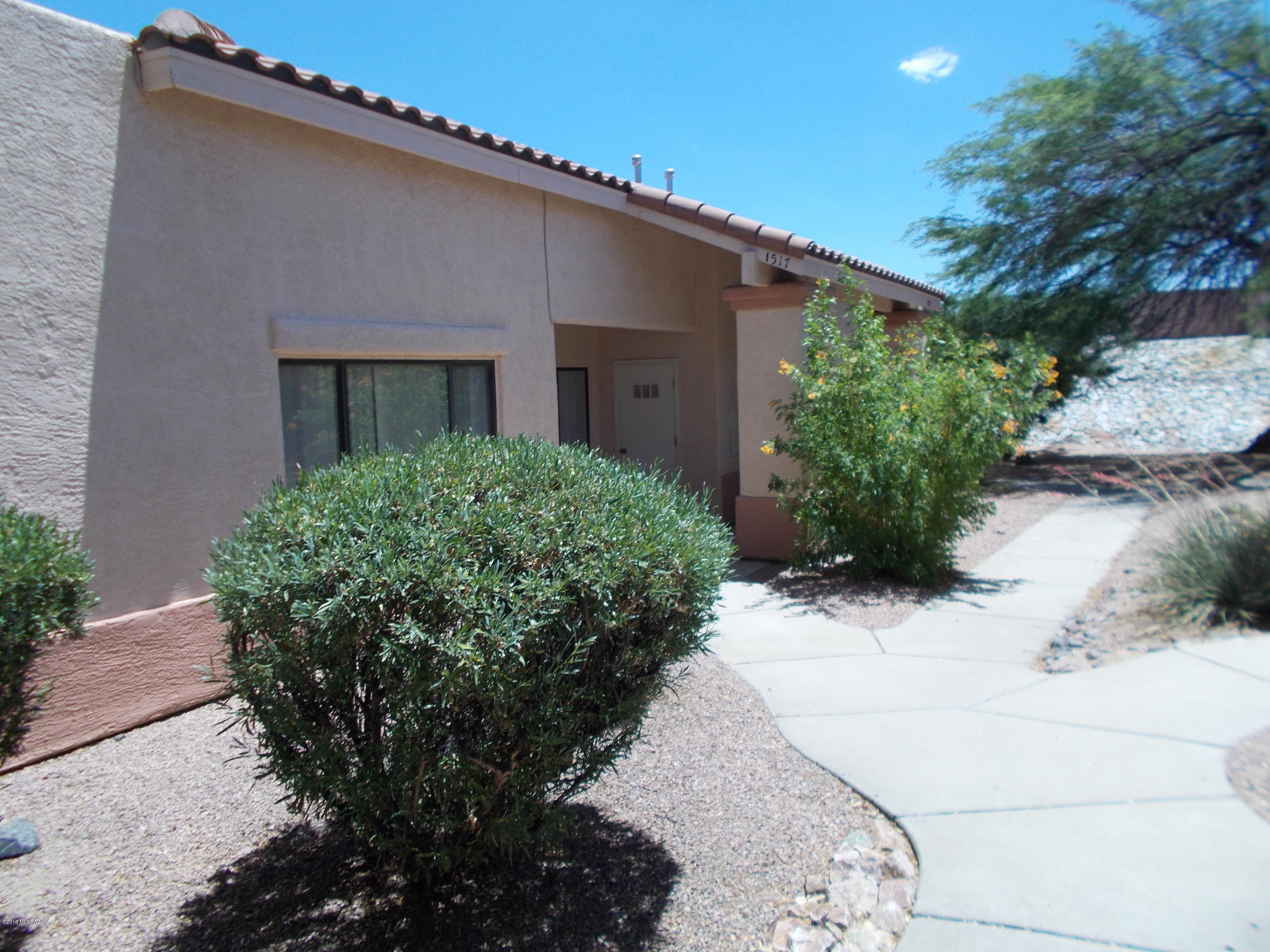 Great location - Light & Open floor plan.Non age restricted 1071 Sq Ft  2 Bdrm, 2 bath - updated - 9' ceilings plus your own garage unit included at this price.