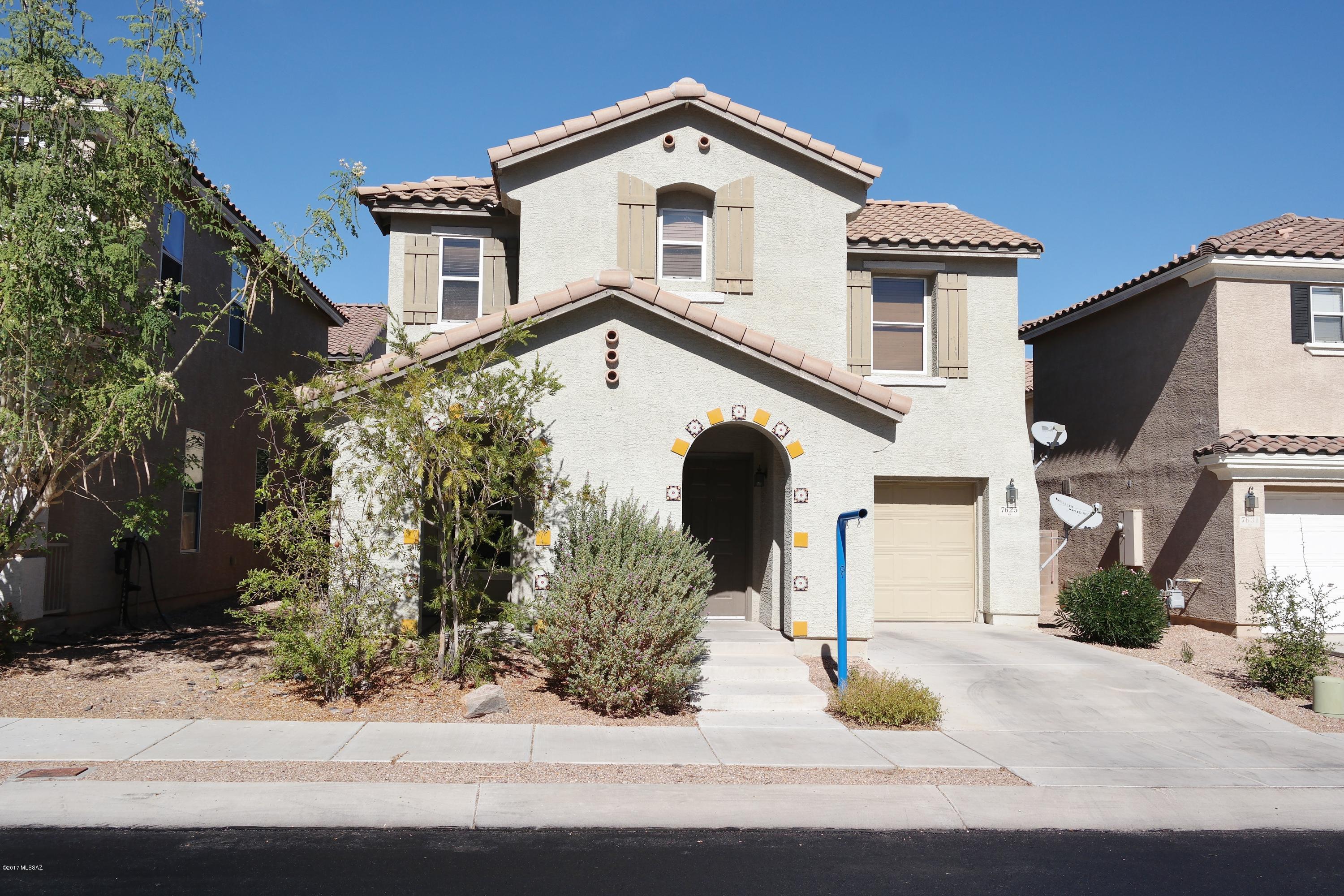 Welcome to Pantano Overlook Community!! This absolutely move in ready home is located in much desired East side community close to shopping, parks, schools, DM Base welcomes you with a spacious family room with separate formal living room, open kitchen concept with lots of cabinets and newly installed countertop. Tile thru out on the first floor, new interior paint and new carpet in at the stair case and all upstairs. This home offers half bath downstairs, beautiful stair railings, 3 nice size bedrooms with ceiling fans thru out and a loft. Low care front and rear yards, covered patio, and covered front porch area. This home is a must see! Come and visit today to make it YOURS!!