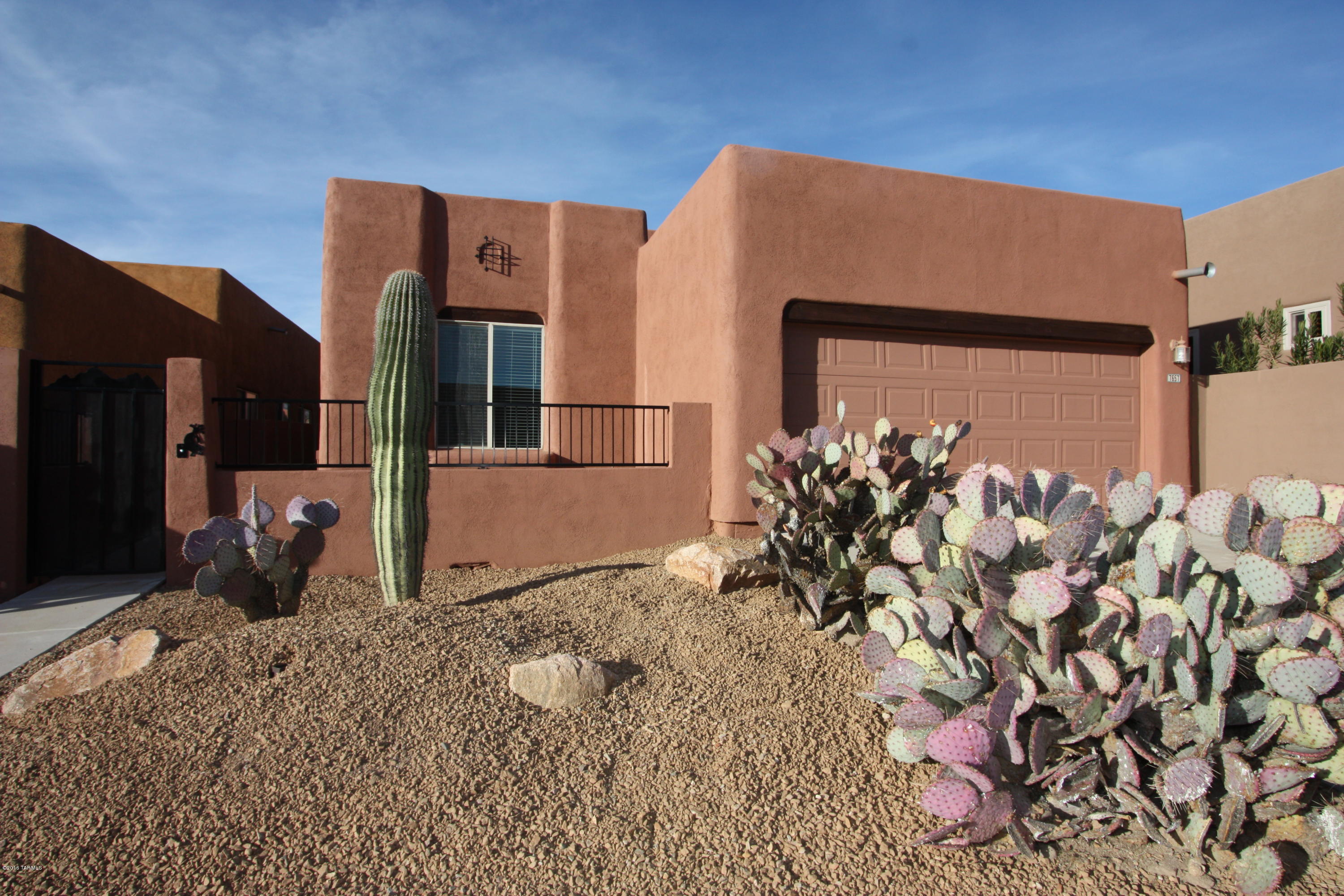 Gorgeous Sante Fe style home in popular Eastside community of Centre Park.