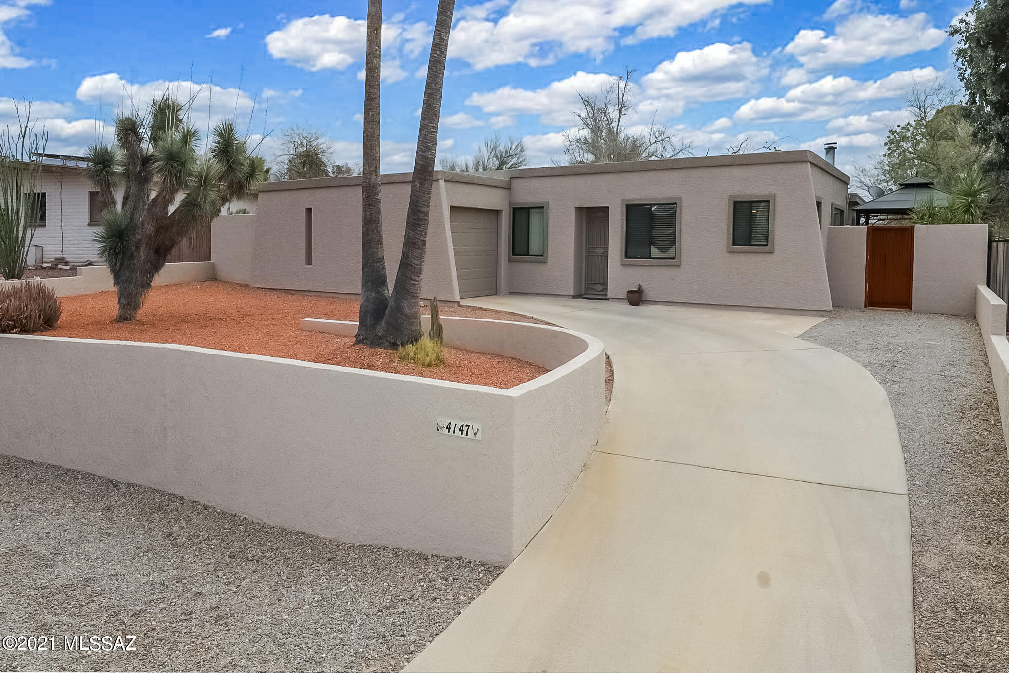 If you're seeking a home to set some roots and create lifelong memories, look no further than this Northwest charmer! No HOA!! This 3 bed/2 bath, one-of-a-kind home located in Jupiter Foothills Estates boasts 1,873 square feet that is perfect for family & entertaining guests! .27-acre lot, 1 Car Garage. Lots of upgrades & appointments; Newer HVAC 2017, DUAL cooling, Water Heater 1.5 yrs , Roof recently maintained, Paneled doors, newer hardware & fixtures. Galley Kitchen w/ gorgeous Granite, Natural light & breakfast area that opens up into a generous family room where everyone can gather! Beautifully maintained Saltillo tile flooring add to the charm the Rustic setting which provides & completes the feeling of home! Large Game/Rec room for pool table, or space for Game Day gathering The Master Suite has den or nursery entrance direct.  Master Bath recently remodeled. Dual Pane windows.  Start your mornings or unwind from your day w/ a private back yard sanctuary that includes Covered Gazebo patio, Hot Tub, Real grass, Huge Sycamore tree as centerpiece of yard. High block walls, mature bougainvillea's & Storage shed to keep your personal items safe! Double gate and room for all your toys!
You won't find another like this in the neighborhood and is located close to shopping, freeway access, wonderful schools and entertainment! Schedule your showing today!