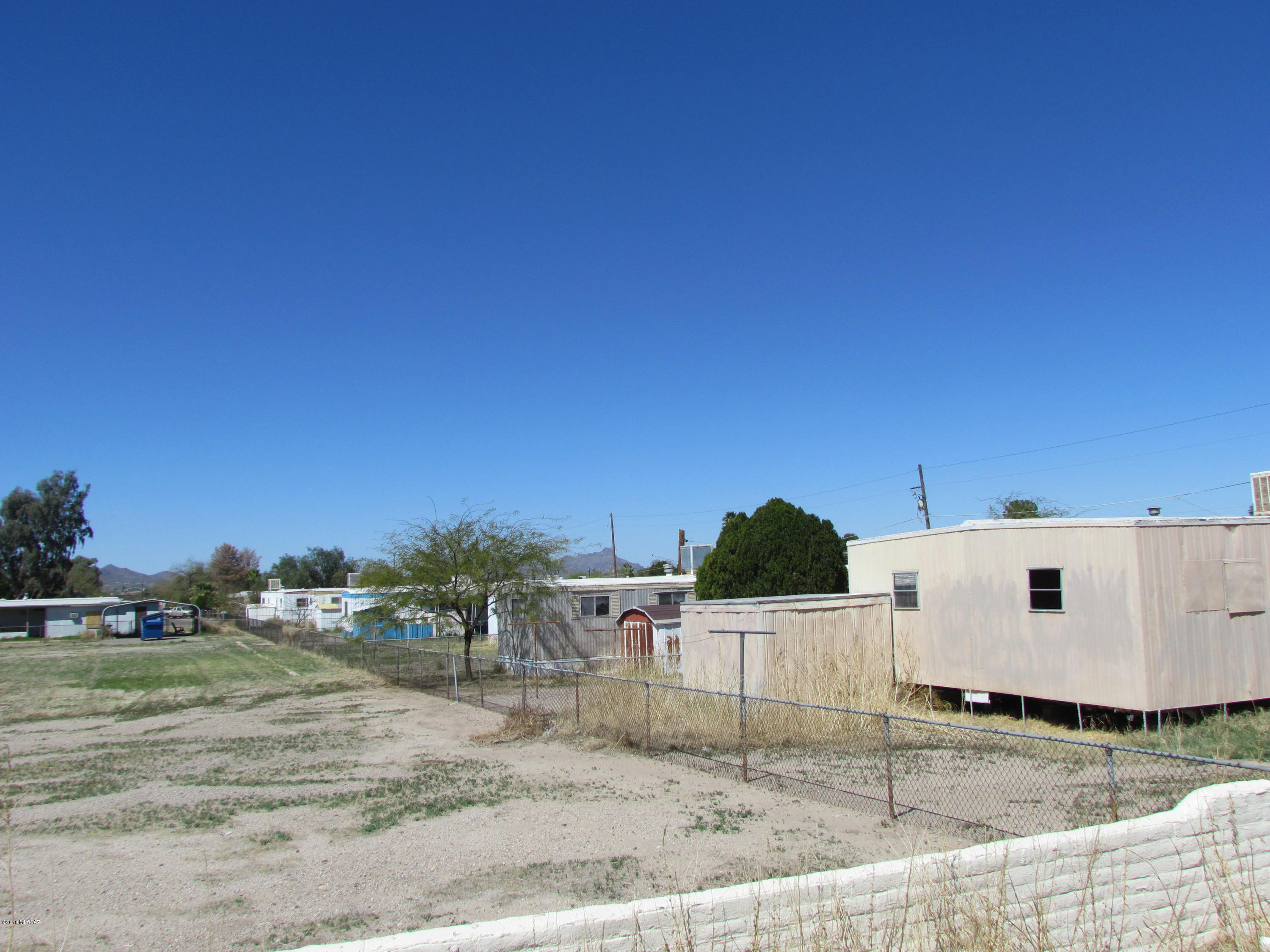 Rare MU zoned. Huge lot, full acre. Amazing investment opportunity! MU Zoning allows for residential, commercial, light manufacturing. MU Zoning includes: Lot Development and Mobile Home Subdivision. Property is being sold as vacant land. Formerly known as Shannon Garden Mobile Home Park. There are 8 mobile home lots with utility hook ups and 7 mobile homes are included in the sale, all mobile homes are in as is condition. All mobiles currently have separately fenced yards. Come view the property and use your own visions and ideas to make this property work for you to generate an income producing investment.