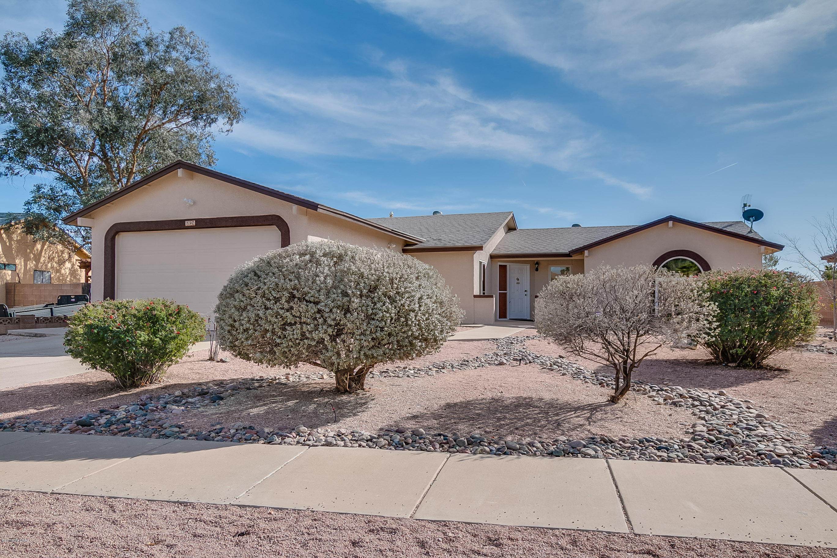 Original Owner who had the home specially built to accommodate her wheelchair needs.  This home is very unique with many fine qualities such as Knotty Alder kitchen and bath cabinets; extra deep drawers and pullouts in kitchen with fantastic pantry pullouts, electric cooktop with pot filler, countertop convection oven and separate microwave, granite counters in both baths, Solar Panels added in 2017, freshly painted inside and out May 2017, gas furnace in 2013, gas water heater in 2012, water softener in 2015, refrigerator, washer and dryer convey, roll-in shower, bidet, and garden tub in master, skylights, huge pool size yard, sidewalk to both gates to back yard, elementary school and park nearby.  Quiet neighborhood and great curb appeal.  A truly amazing home you don't want to miss. Buyer will need to qualify and assume solar lease.