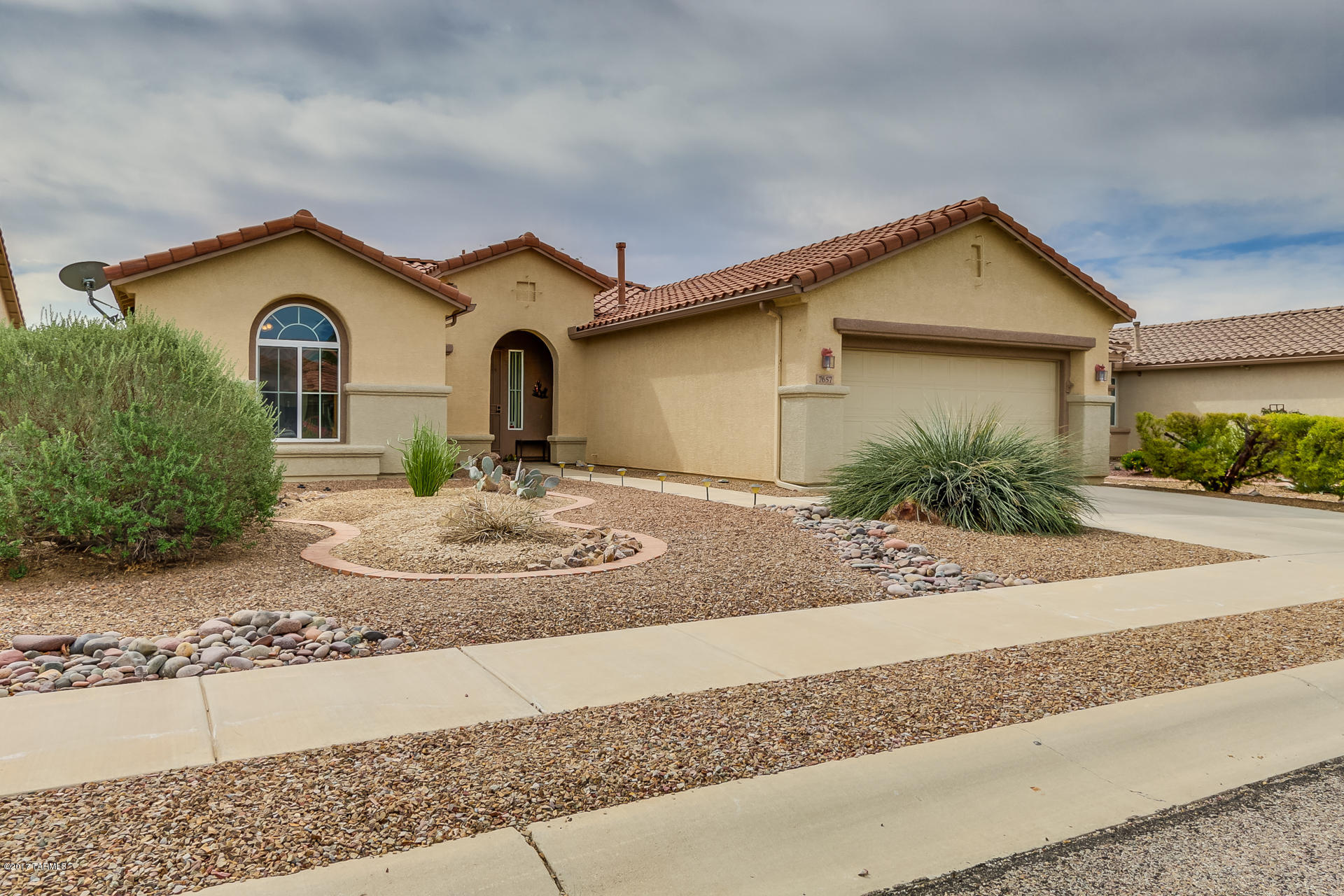 Resort-style living in the Active Adult 55+ Community of Sunflower. Popular San Carlos model 2Bdrm/2BA & large den. Updates include newer SS appliances/ glass block backsplash/ KT faucet/ KT Counter tops/ Tile added to GR & Guest Bath/ Hot Water Heater & Irrigation System in 2016/ MBA has newer faucet & lighting (MBA mirror does not convey)/  Guest BA newer lighting. Laundry area has built-in Pantry & cabinets. Enjoy indoor/outdoor living in screened & tiled Arizona Room overlooking low maintenance landscaping. Community amenities include: Resort style pool & spa, Exercise facilities, BBQ area, Racquet Courts, Putting green, Bocce Ball courts & exquisite Village Center w/daily planned activities and all included in the Association dues! Be sure to check out the Virtual Tour!!