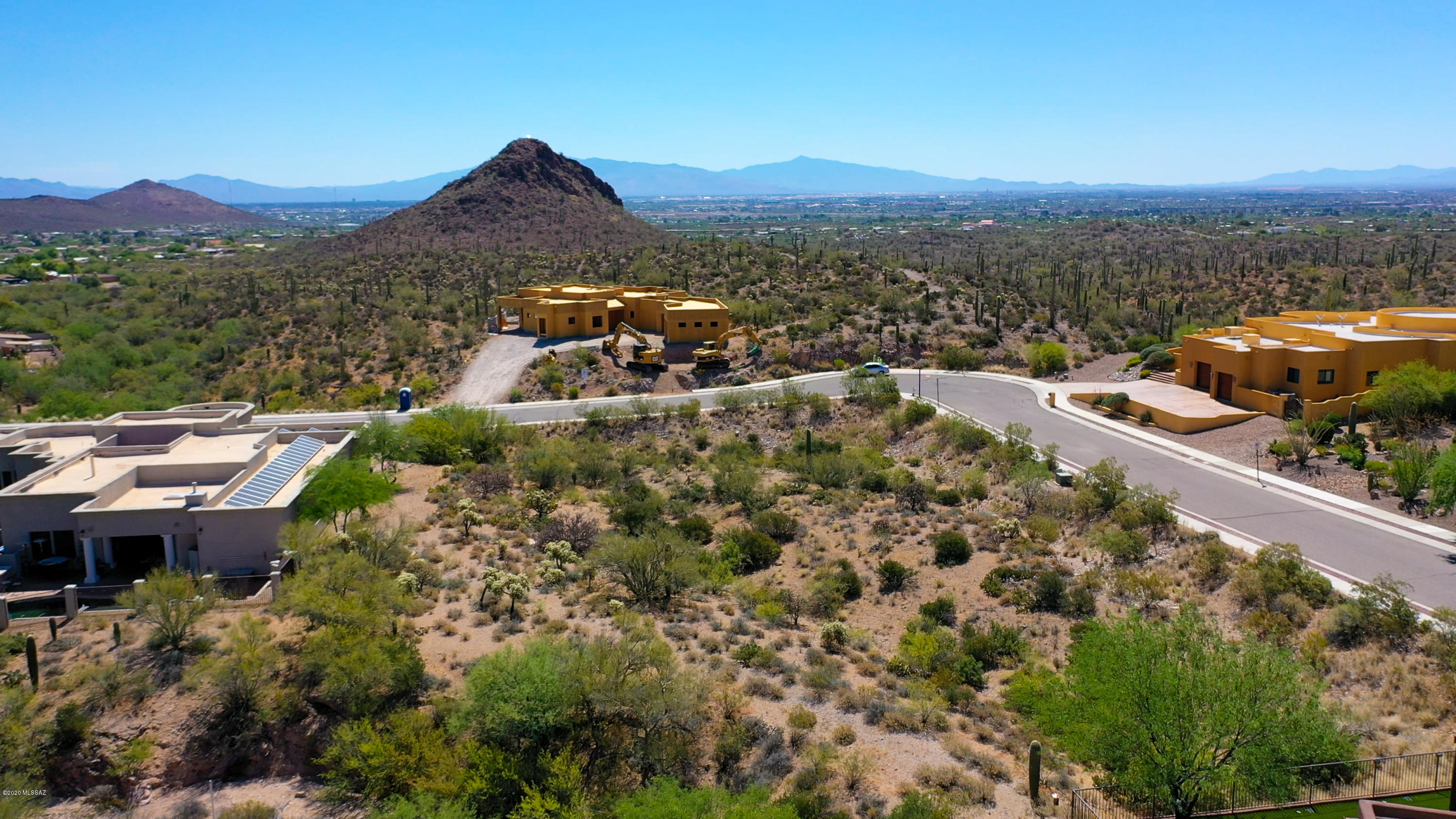 Gated community and breathtaking views. Welcome to the gated community of Wildcat Pass! This quite escape nestled in the Tucson mountains has breathtaking views of the city, the Star Pass golf course and nightly sunsets. This lot has all utilities at the lot line and is 5 min from J.W. Marriott, 7 minutes from downtown and 12 minutes from the U OF A.