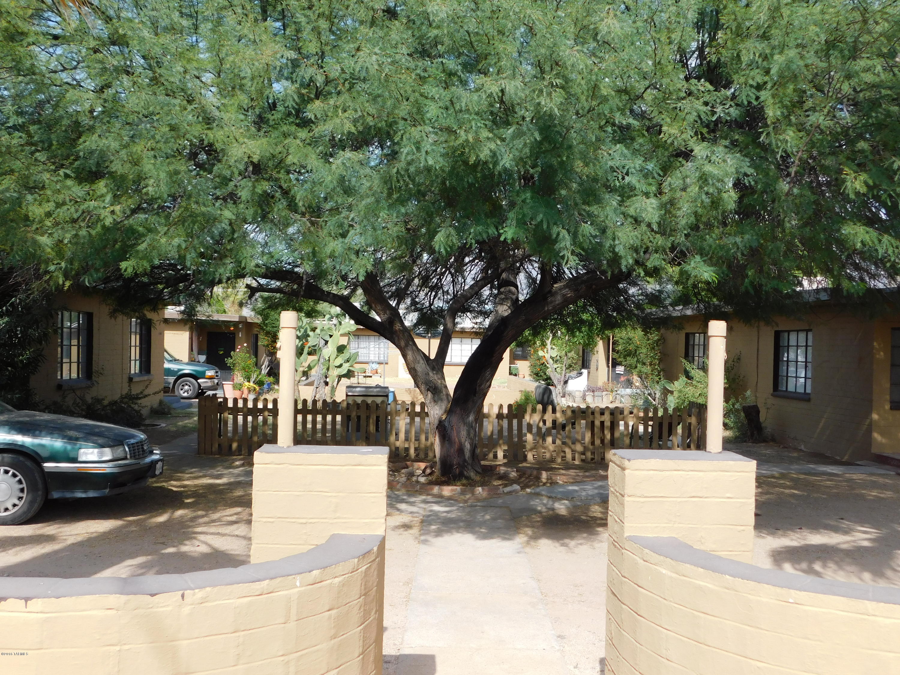 5 Duplexes on large lot. Units are various sizes.  Some units have fenced in yards and W/D hook-ups.  Large central courtyard for all units.  Mature landscaping.  Central location near transportation, shopping, restaurants and much more!