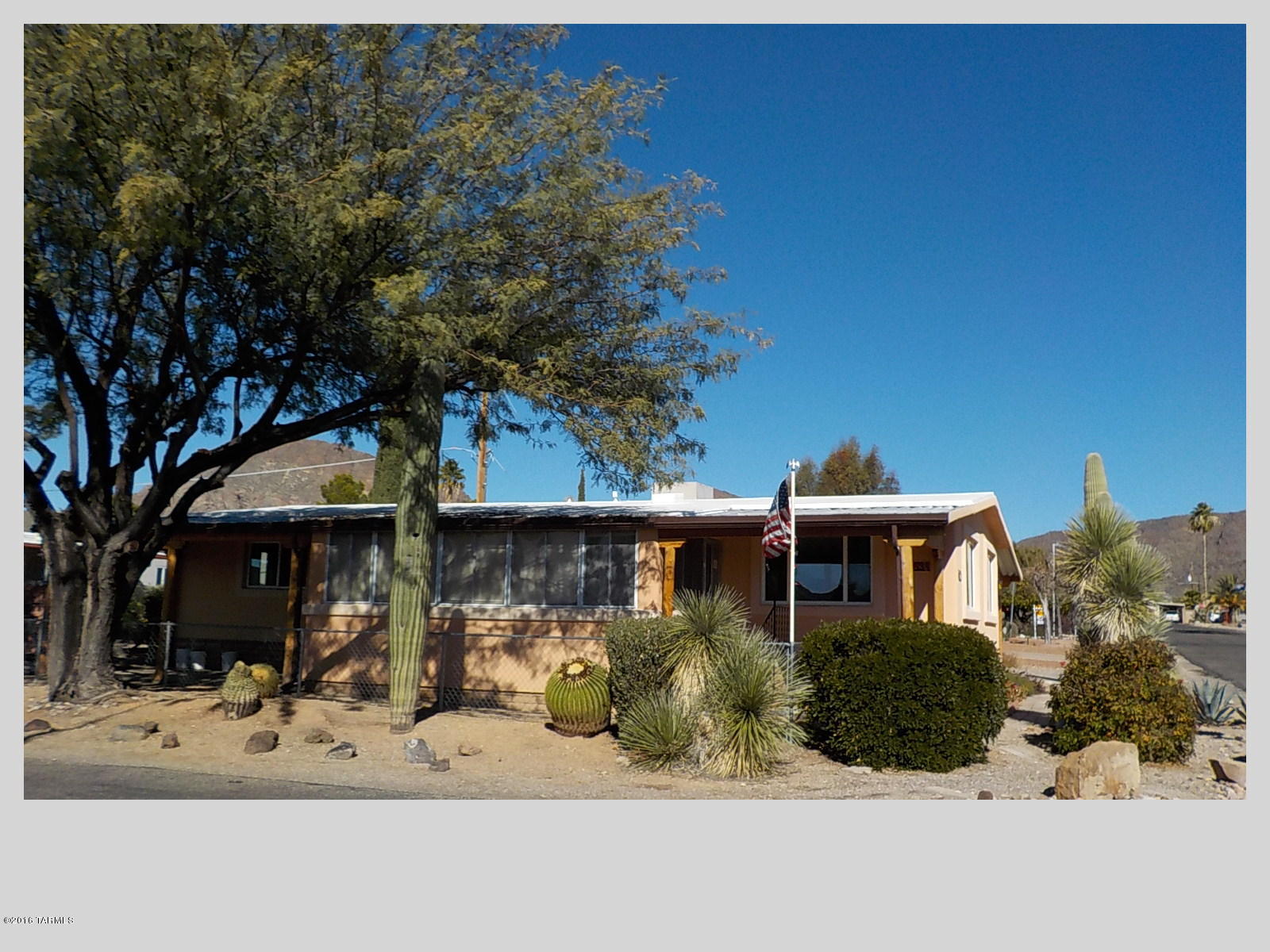 55+ community with so many amenities including an 18 hole golf course.  This home sits on a corner lot with a huge mesquite tree for wonderful shade. Great views of the mountains whether you are in the enclosed glassed AZ room or sitting at the kitchen table having breakfast.  updated kitchen with new appliances.  New water pipes from the meter in. Updated bathroom--Nice wide hallway. Third bedroom could be an office. Nice laminate flooring except living room and one bedroom.  Copper wiring, new low E windows. New water heater. Stucco exterior. Water cooler plus central air.  Landscaped yard with beautiful roses, and herb bed. Workshop and a shed.