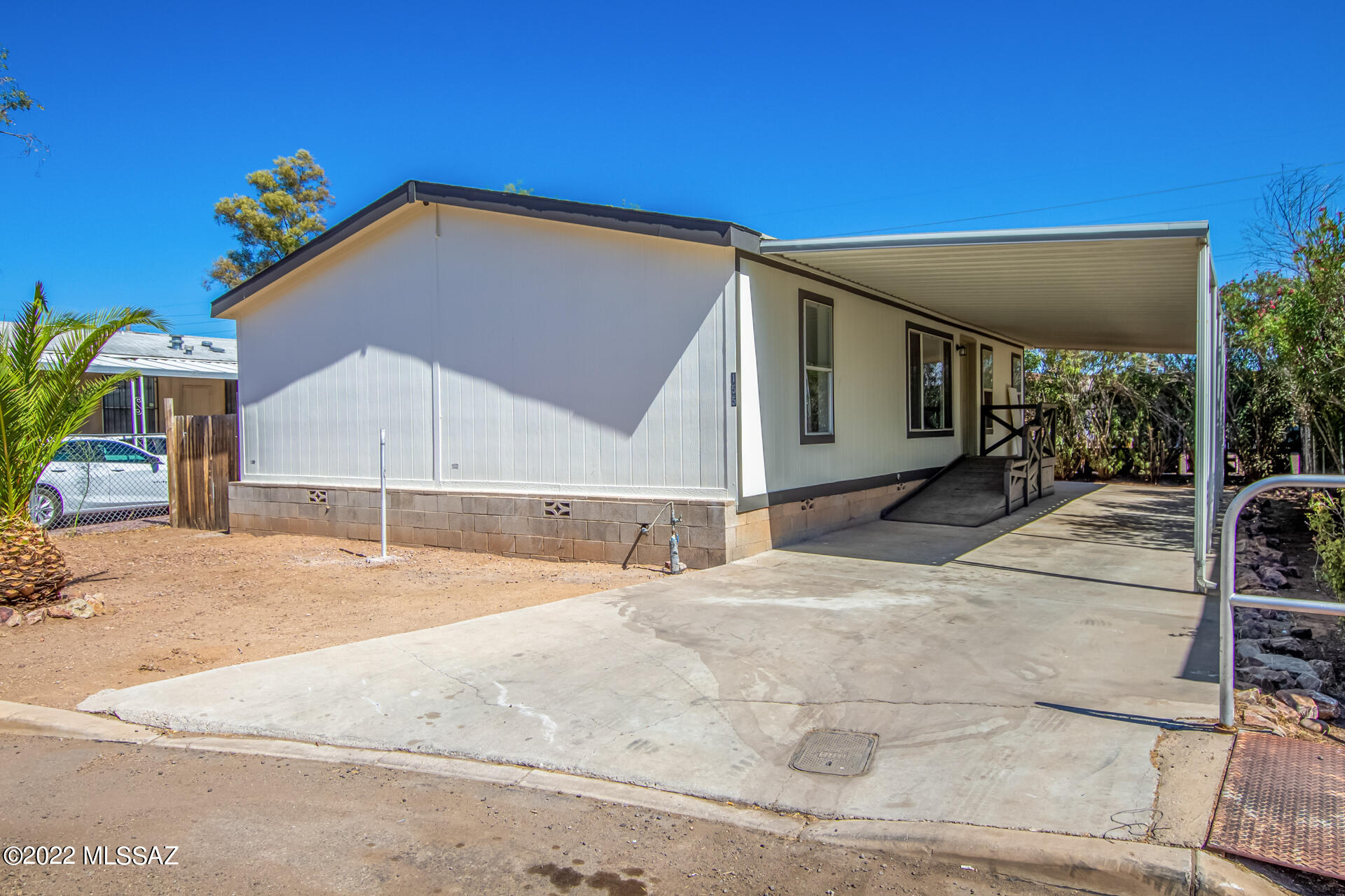 Beautifully updated 3 Bedroom, 2 Bath manufactured home on private cul-de-sac lot. Turnkey property.  Open floorplan. Wood-look floors, vaulted ceilings, updated light fixtures/ceiling fans, and dual pane windows. Chef's kitchen has white cabinets, new SS appliances, pantry, and new counters. Primary bedroom has a walk-in closet, ensuite bathroom w/dual sinks & soaking tub. Carport. Perfectly-sized backyard w/ storage shed. This one won't last. Please call to schedule a showing. AGENT/OWNER.