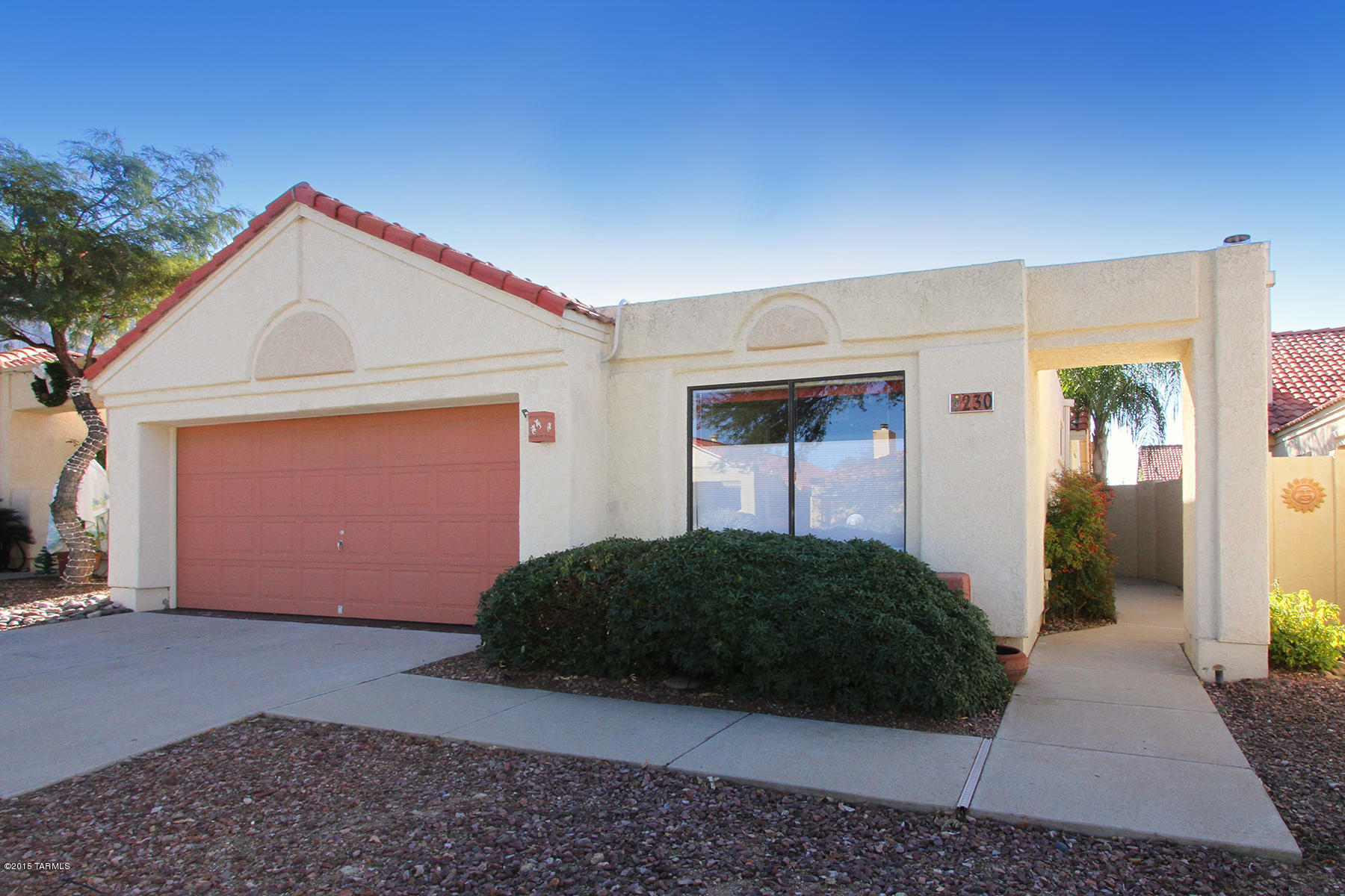 Great opportunity to live in this wonderful Oro Valley location. this home is nestled on a quiet cul-de-sac, and includes Mountain views of Push Ridge, fruit trees and a patio full of life for outdoor living. the interior features newer carpet, newer appliances, and newer cabinets in the kitchen. The format of the home flows from room to room with high ceilings in the great room, fireplace, and lots of windows to let the sunshine in. It also features a two car garage, community pool and spa within walking distance plus it's close to Hospitals, doctors, bus line, Tucson Mall, and all the great shopping that Oro Valley has to offer.