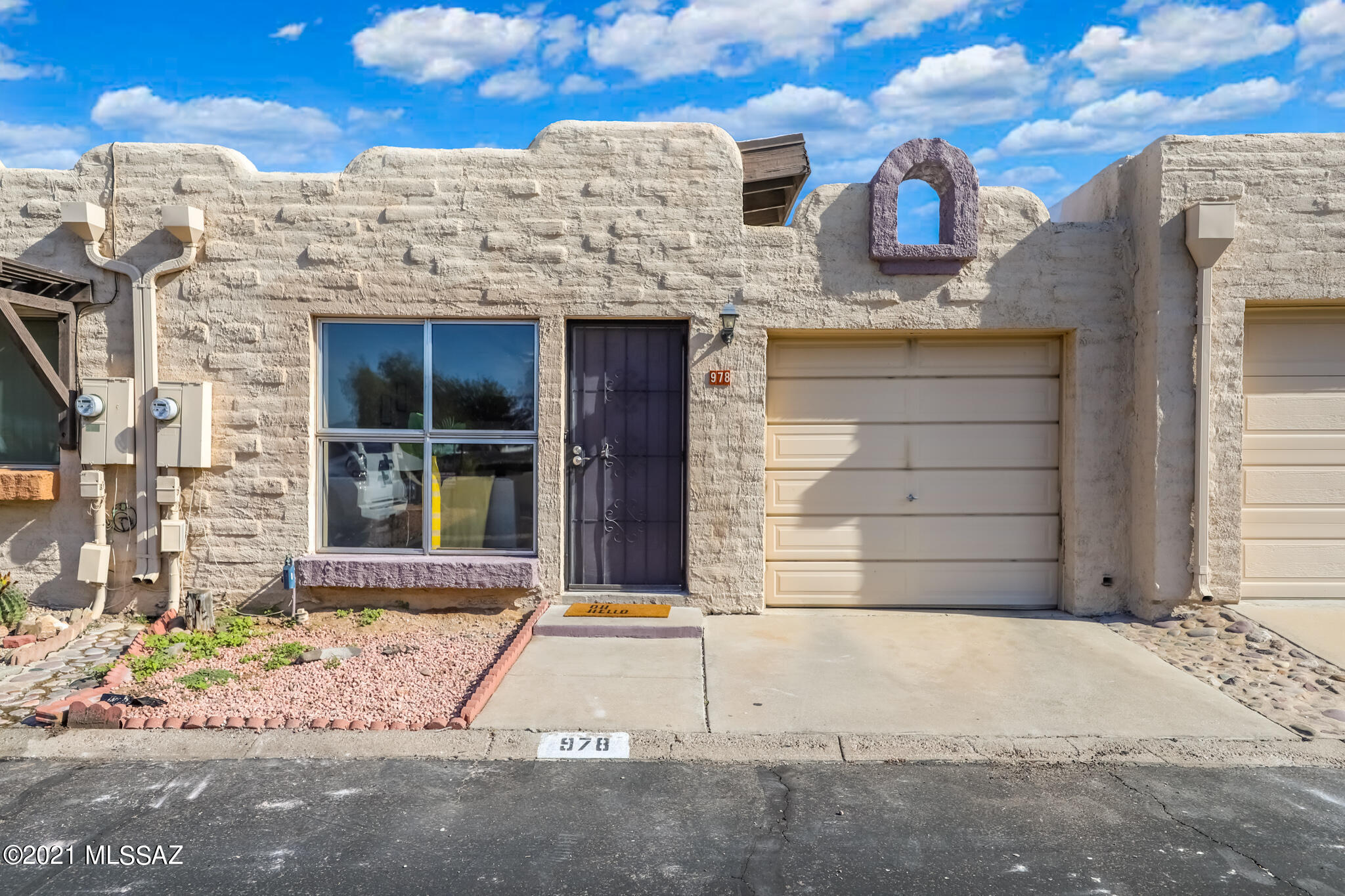 Beautifully updated 1 bed/ 1 bath townhouse located across from the community pool/Spa with lots of guest parking. Fresh palette and new flooring throughout. The kitchen is equipped with an electric range, microwave, refrigerator, and breakfast bar. Convenient location near Tucson Mall, Rillito River Parkway and NW Hospital. Make this your dream home! Owner is a licensed agent.