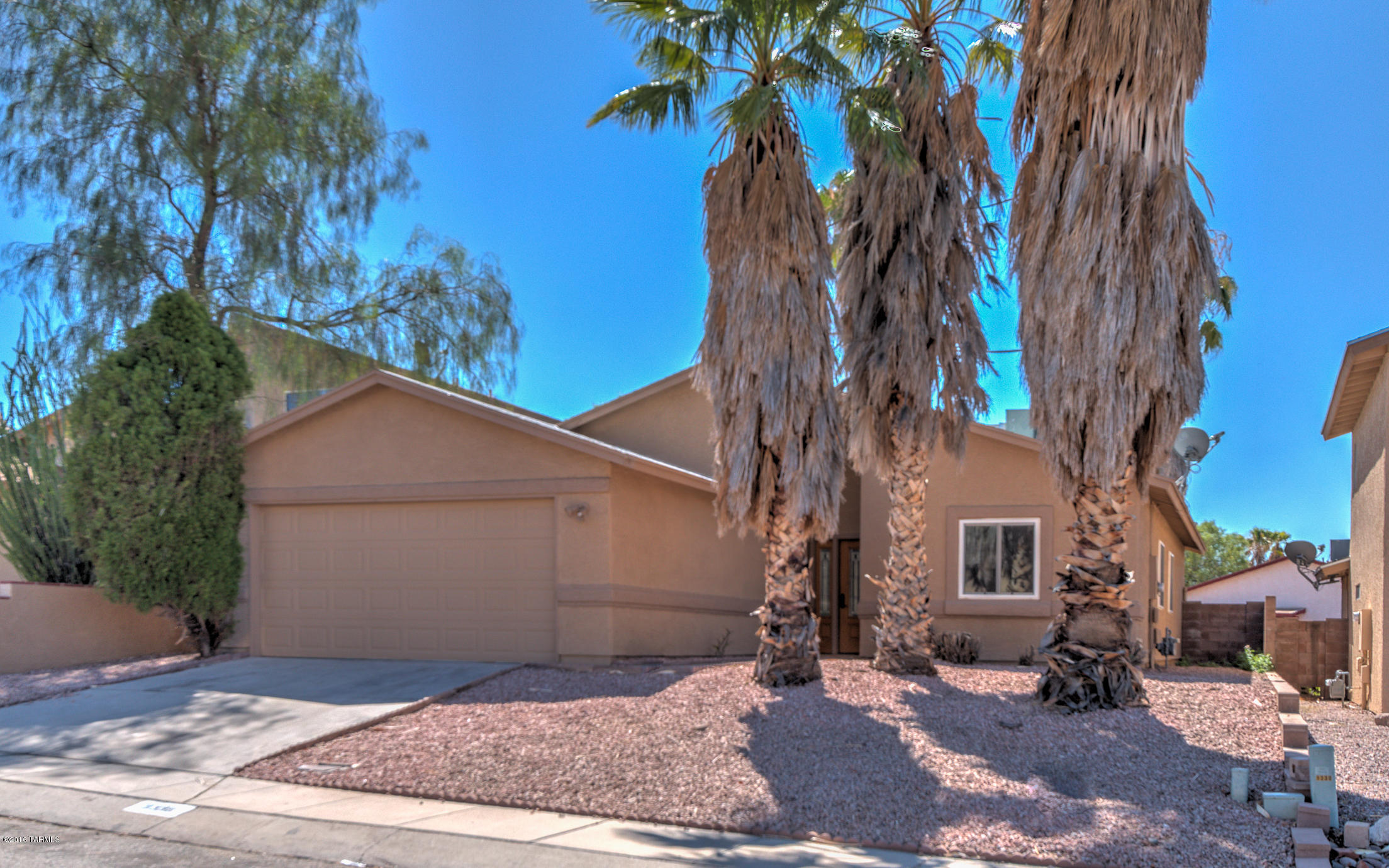 If there ever was a move-in ready home, this is it! Enter through frosted glass/ wood doors into a home which is warm & cozy. Eat-in kitchen offers decorative tile back-splash & solar tube for extra light. LR features FP, vaulted ceilings & solar tube. Triple pane windows, wood & tile flooring throughout plus ceiling fans in most rooms make this home comfortable & easy-care. Freshly painted inside & out, w/ updated landscaping, polybutylene replacement & complete pool re-plastering, there’s nothing to do but pack your bags!