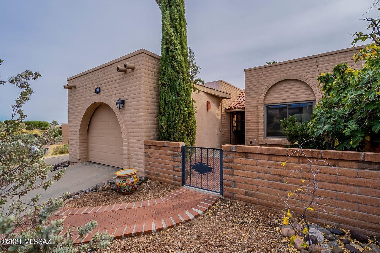 This beautifully furnished end unit townhome comes with everything you need to move right in. With fantastic panoramic views from the back patio and views from several rooms inside, you can watch the sunrise in an easy chair or on the patio.  In the evening you can relax in the front courtyard for a view of the sunset.  It is perfect for entertaining friends and family.  This is a very private property with a common area between it and the next home and a wide open space behind it.  It is a meticulously maintained home that has the major projects completed for you.  This is a great home for a full or part time resident.  Just bring your suitcase and enjoy your new home!