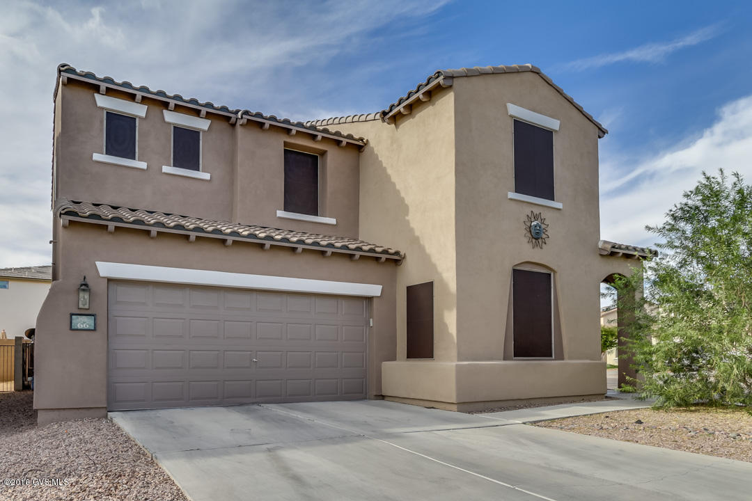 Popular Toledo Model by Pulte Homes. Located on an oversized Corner Lot, this home has a lot to offer. Fresh exterior paint and solar shade screens, add to the curb appeal. Spacious 2,221 sq ft home features 3 large bedrooms, 2 1/2 baths, and a HUGE loft/game room that could be a BIG 4th Bedroom with the addition of a closet. Beautiful wooden floors throughout the downstairs, adds to the dramatic look of this home. This floor plan features a formal living room, separate dining room, and a family room off the kitchen. Well appointed kitchen with breakfast bar and roomy pantry. Large Master Bathroom with two separate sink vanities. Large upstairs laundry room include washer and dryer. Generous landscaped backyard features low maintenance faux lawn, planting beds and a storage shed.