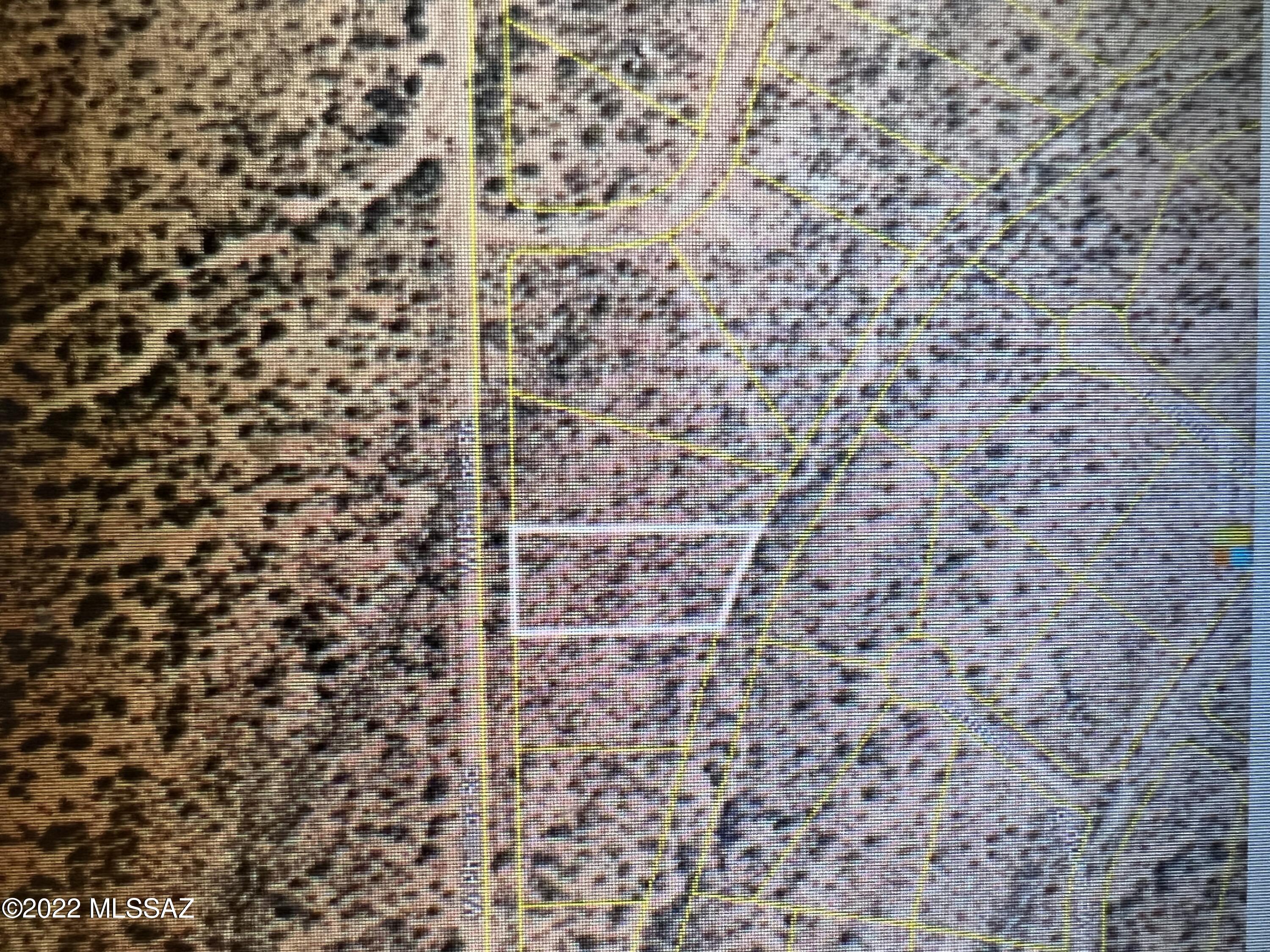 Now is your opportunity to stake your claim in the beautiful Sonoran Desert. Own 1 full acre for only $7,900.00 in sought after Diamond Bell Ranch. Easy access and flat topography.