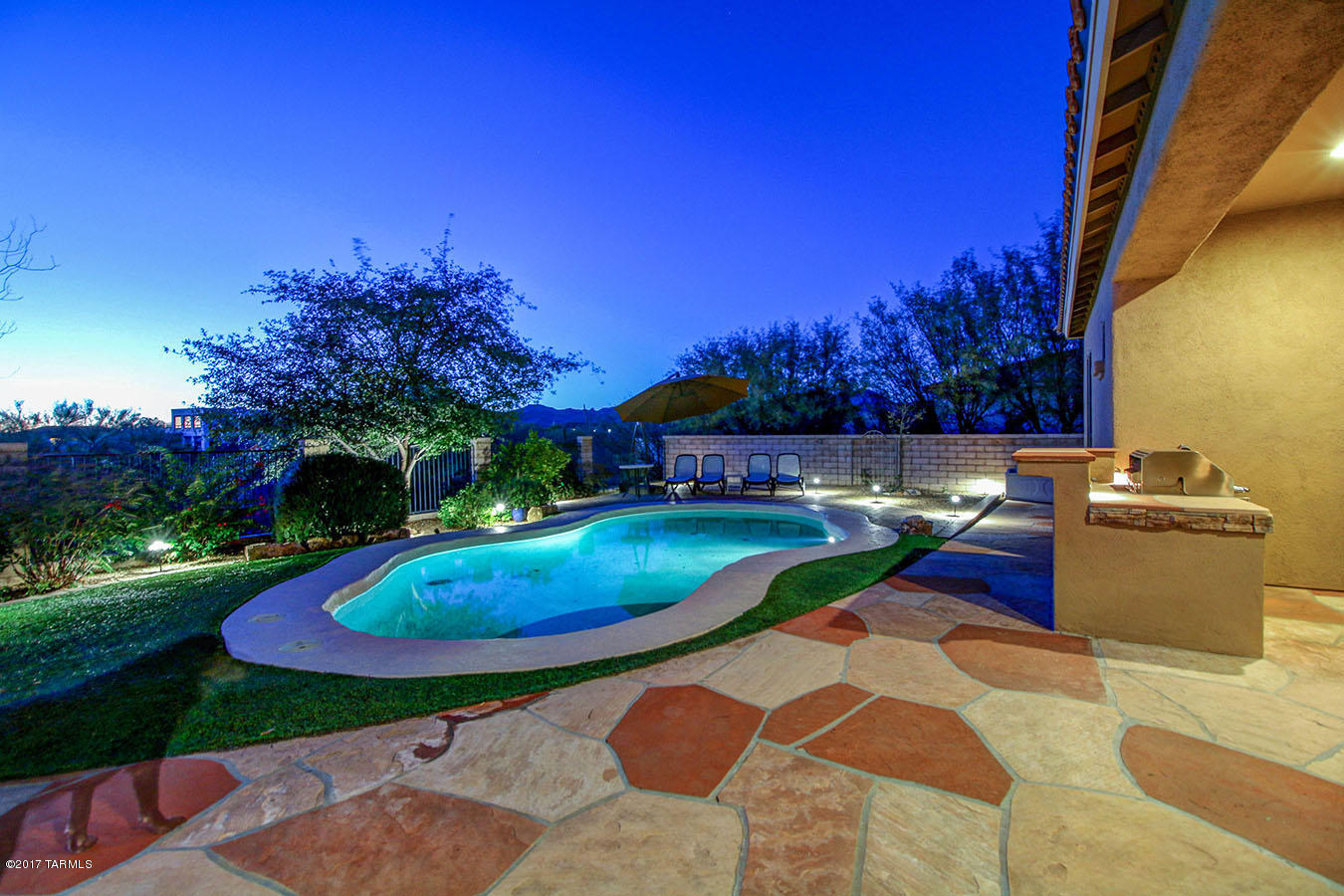 Awesome 1 owner home! AMAZING AF Sterling home in Vistoso Highlands. GREAT ROOM plan features highly upgraded finishes, split bedroom plan, NEWLY PAINTED bonus room, slab granite, new SS Wolf gas cooktop & oven+newer SS balance of appliances, tiffany pendants, dining & entry lighting, formal dining, master suite with feature wall of gem & rock wall, newly remodeled bath to includes slab granite throughout, custom mirrors, soaking tub, walk-in shower w/frameless glass enclosure, 2nd Bdrm is en-suite, Rustic Metal garage doors, Crtyd w/views of Catalina Mtns, NEWLY PAINTED-IN & OUT 2017 ,  NEW security doors & gate, covered flagstone paver patio & oasis yard, with Pebble Tech Pool, raised patio, kiva fp, amazing sunsets & mtn views. Truly a treasure. CHECK PHOTOS & CLICK VIRT TOUR FOR 3D VID This home also boasts 20x20 porcelain tile, new LV hand-scraped flooring in bonus room, master bedroom & closet, outdoor Jenn-Air BBQ, cabinetry is raised panel w/crown molding and rollouts in kitchen, ceiling fans in all bedrooms, bonus & great room, surround sound and so much more. A community park completes this wonderful family neighborhood with a basketball court, 3-ole putting green, large covered play structure and astro turf.   This home has been loved and cared for and shows beautifully and if offered with an American Home Shield Home Warranty and transferrable termite warranty.  Priced to sell quickly ~ don't miss this one!!  Call for your private showing today