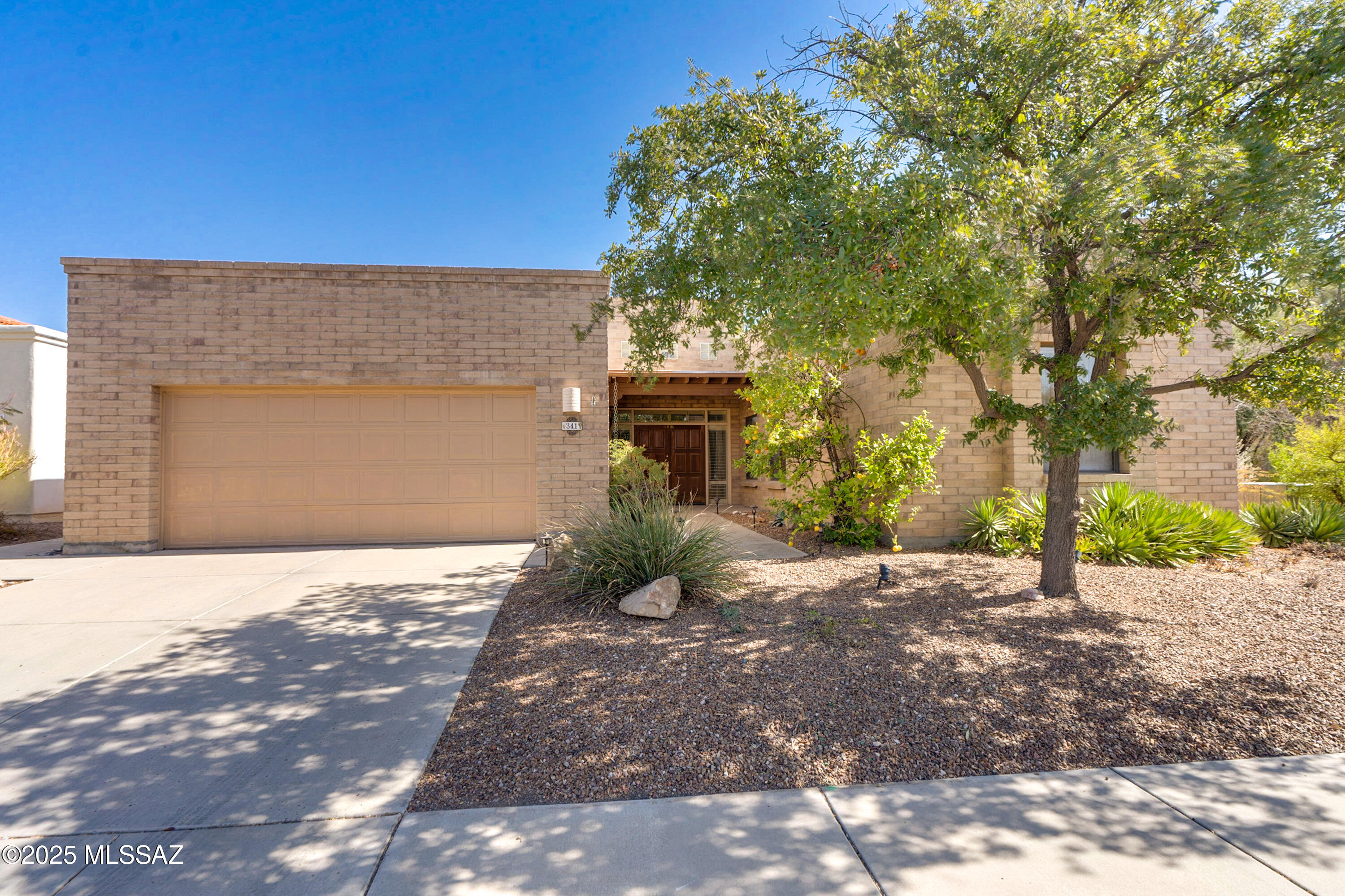 Welcome to this charming home in a small, private gated neighborhood, ideally located just moments from shopping and entertainment. Featuring newer Cafe appliances (2024), this property blends modern convenience with comfort. The home boasts beautiful tile flooring throughout, offering both style and low-maintenance living. Enjoy peace of mind with a newer HVAC system (2024), ensuring year-round comfort. With its prime location and thoughtful updates, this home is perfect for those seeking both privacy and accessibility. Don't miss out on this opportunity!