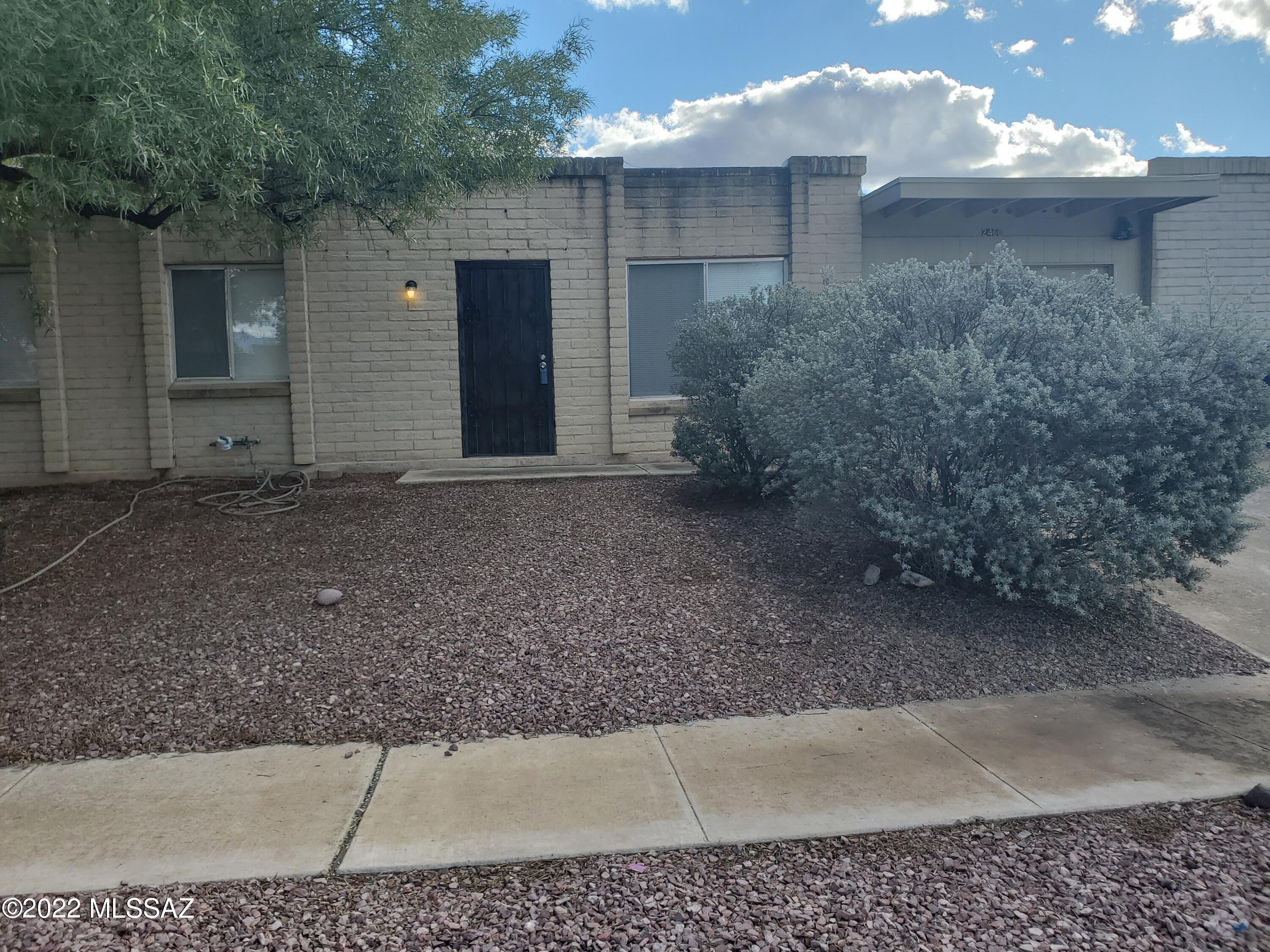 Lovely 3 Bedroom/2 Bath town home in quiet, established neighborhood on the east side.  Large fenced yard, sun room, laundry room with washer/dryer hookup, and garage. Refrigerator, stove, & dishwasher included. Ceiling fans in several rooms. A/C.  Being sold ''as is''
