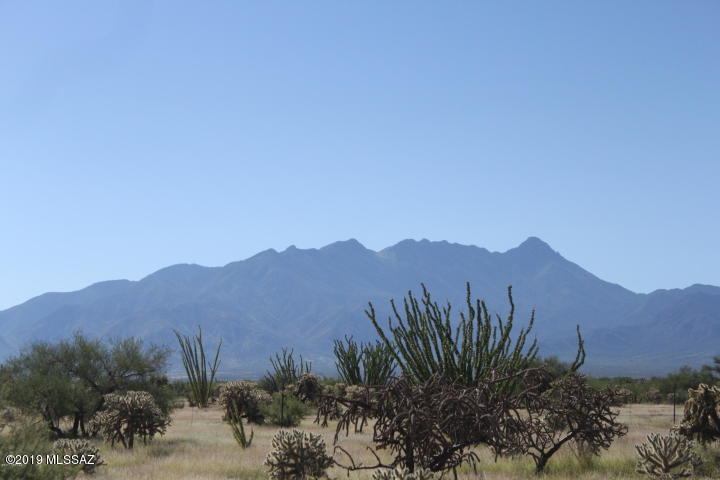 Gated 2 plus acre lot with unobstructed views of Santa Rita's and Madera Canyon, Private, serene, neighborhood starting to fill with newly built custom homes.  All utilities at the curb and in a cul de sac too.