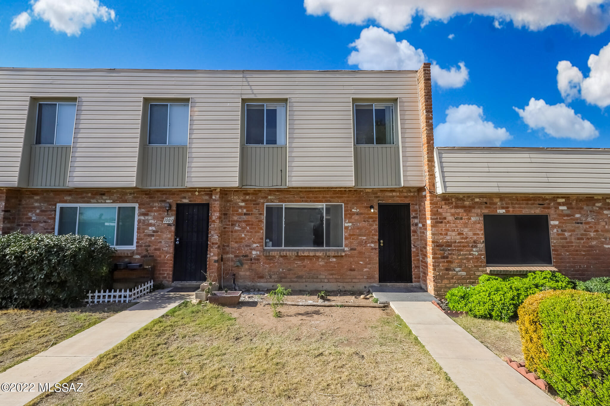 Previous Buyer's loss is your opportunity! Welcome Home to this Beautifully updated & very spacious 2 story, 3 bedroom, 2.5 bath townhouse featuring newer HVAC, newer roof, water heater, gorgeous luxury vinyl flooring, granite countertops, stainless steel appliances, and tons of storage throughout! All bedrooms on 2nd level. Beautiful shared/common courtyard area. Dedicated, covered parking. Trash and water included in HOA. Desirable and convenient Eastside location. Priced below Appraised Value! Call to schedule your private showing today!