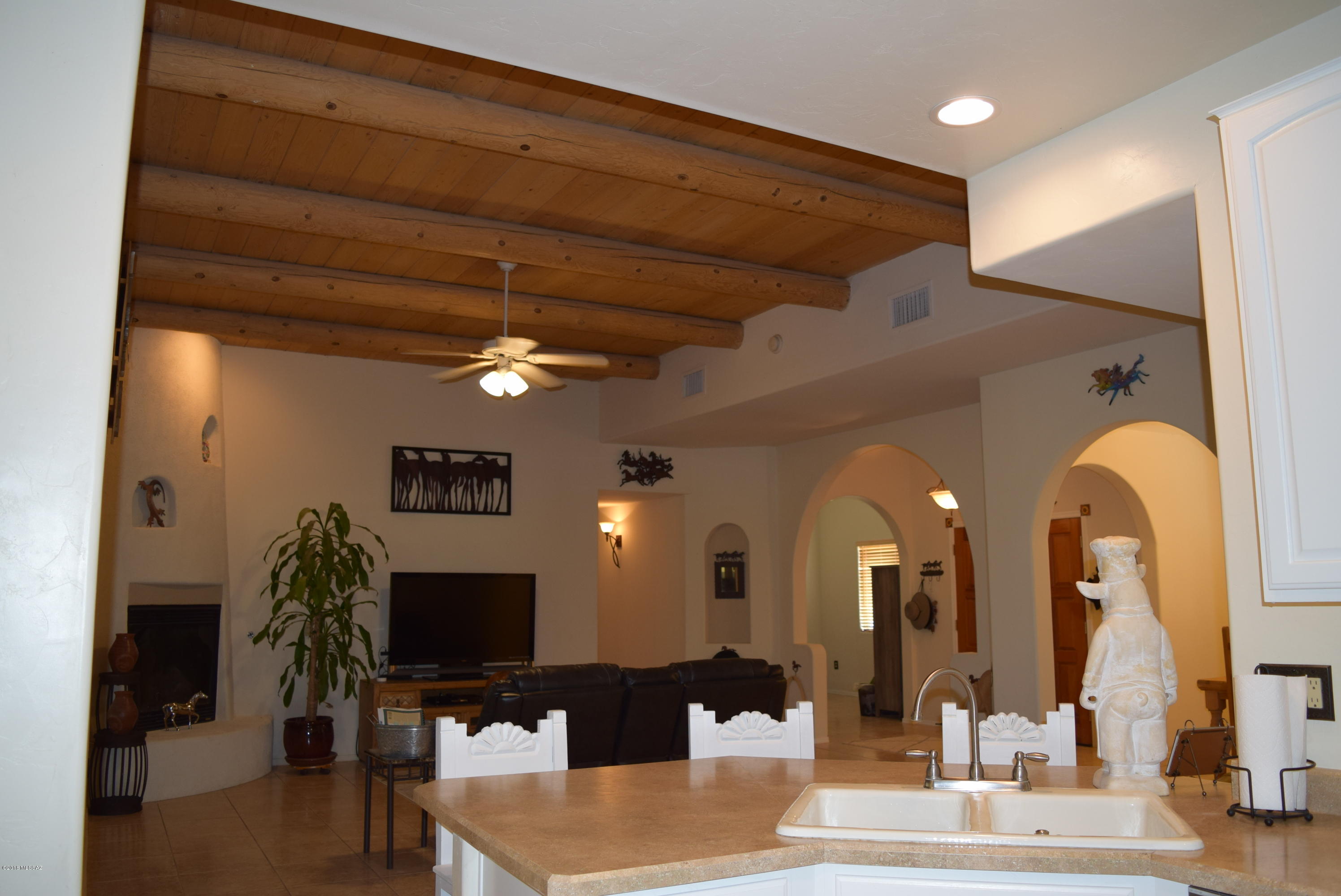 Yes you can OWN a Ranch! The Home: Gorgeous 2005 Semi-custom Sombra built Santa Fe w/Greatroom, remote gas fireplace, kitchen w/updated cabinets, 2016 S/S Slate appliances, breakfast nook & bar, Spacious Master Suite w/Walk-in shower & garden tub, 2 other bedrooms good sized, ceiling fans all rooms, & NO carpet. 1200 sq.ft. Rec Room (additional sq. footage) w/17 ft. Swim Spa, Exer. area & room for entertaining. New 2018  A/C & Heater for main house & Rec. Room.The Property: Approx. 17.5 ACRES w/covered stalls, water, hay storage, tackroom, round pen, & 150 X 300 arena. Perfect for Events, Training, Rescue or Pleasure (unlimited tails just minutes away). 40X60 Shop w/hoist, roll-up door & hanger doors, work tables/cabinets, office area.   One owner is licensed to sell real estate in Arizon Two tax parcel numbers 208-43-0160 & 208-43-0090. Homes only SR zoned property w/NO HOA. Relaxing commute to I-10, Oro Valley, Raytheon, Downtown, shopping & restaurants.