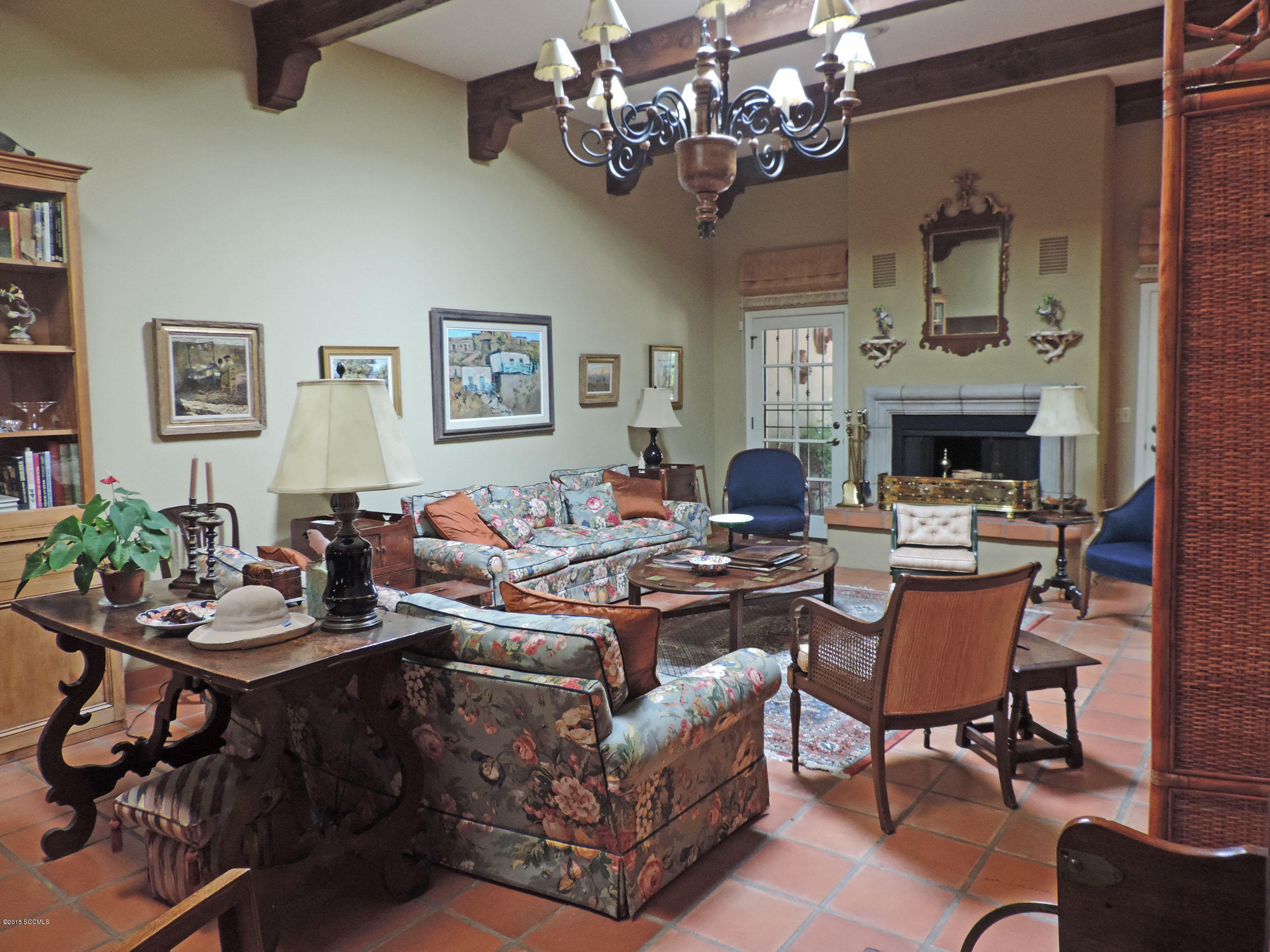 Fantastic Price, Great House. Custom home in prestigious Tubac Golf Resort built with privacy in mind. Master bedroom has large AZ room opening to private patio area. Built-in bookshelves in den/office. Easy care tile throughout. Serving area and wet bar adjacent to dining room. Patio doors throughout invite you out to the large walled back yard - perfect for a pool & spa. Inviting large covered patio. Beautiful mountain views. Hot tub does not work.