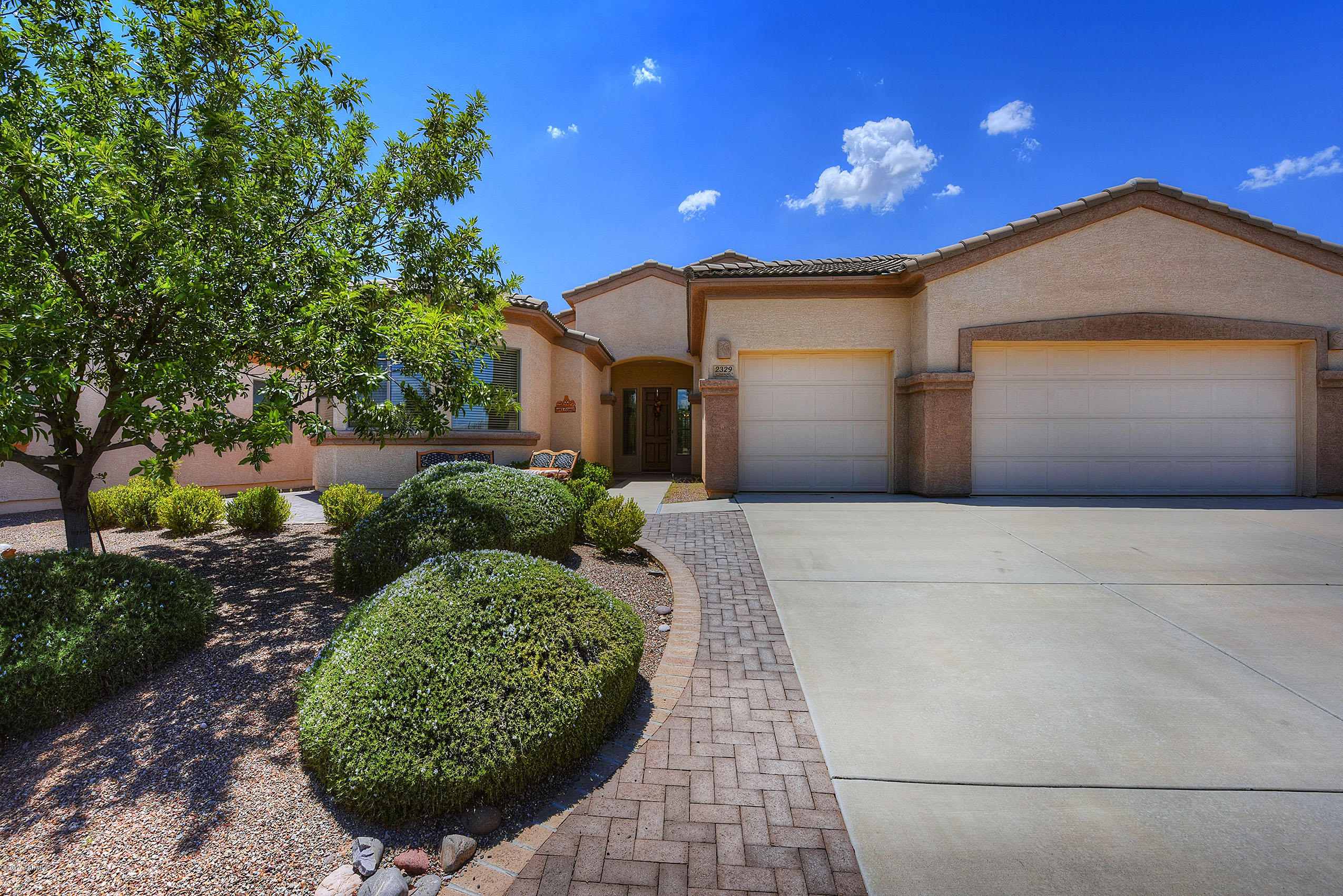 Surrounded by magnificent mountain ranges on all sides you will find this lovely like new home in the Gated Canoa Northwest community. This spacious move-in-ready, Granville Model features a Split Floor-Plan with 3 Bedroom 3 Bath, 3 Car Garage,  Den, Screened Porch, a wonderful large kitchen with Island & Corian Counters, exquisite Master Suite with an amazing bath that features dual sinks, separate tub & shower, &  large walk-in closet. Some of the many tasteful upgrades include Plantation Shutters, Professional Landscaping, Roll Out Shelves, New Stove, New Washer a beautiful fireplace & much much more.. Membership in GVR gives access to world class recreation centers and an indoor pool minutes from your new home! Come see it before its gone!