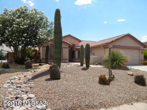 Well appointed Oakmont with many upgrades in kitchen and baths.   Gas range, ceiling fans, and extra cabinets in laundry room.  Water Heater recently replaced.  Back patio has sun shades installed.  Well landscaped.