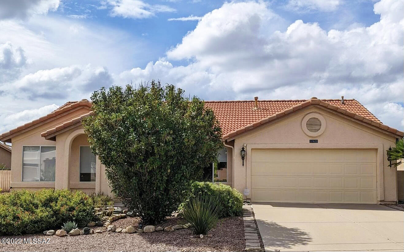 We are Proud to Present a Loma with beautiful yard with mountain views. This 2 Bedroom / 2 Bathroom / 1,264 SF / 2 car garage home is just the place to call home. New carpet throughout most of the home. Tile in the kitchen & bathrooms. Great room has French door leading to the covered patio. The Kitchen has a nook area for more seating to enjoy your morning coffee. Owner's Suite with bathroom & walk-in closet. Guest Bedroom with closet has guest bathroom near by. 2 Car Garage has utility sink (not hooked up, has plumbing & has base) & wall of cabinets for storage. HVAC & W/H are newer. The backyard is spacious with endless possibilities & there's space for a casita, pool or just extending the patio for your pleasure. Trees to provide shade & beautiful mountain views to enjoy. Welcome Home!