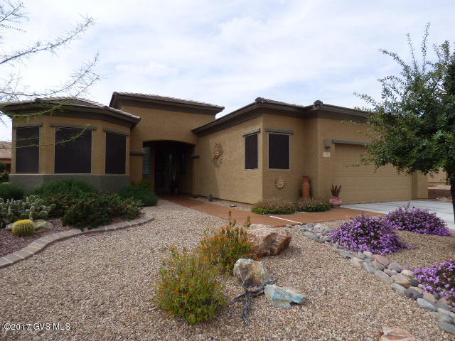 This Beautiful San Dimas model has it all, 2 Bedrooms, Den, an Office with built-in cabinets, and a 2 1/2 Car Garage with a 4 ft. extension. Tile Floors, Corian Countertops, Cherry Cabinets and many more great features. Low Care Yard with a extra shade. This yard would be great for entertaining.
 This is one is 1st Class. Must See!!