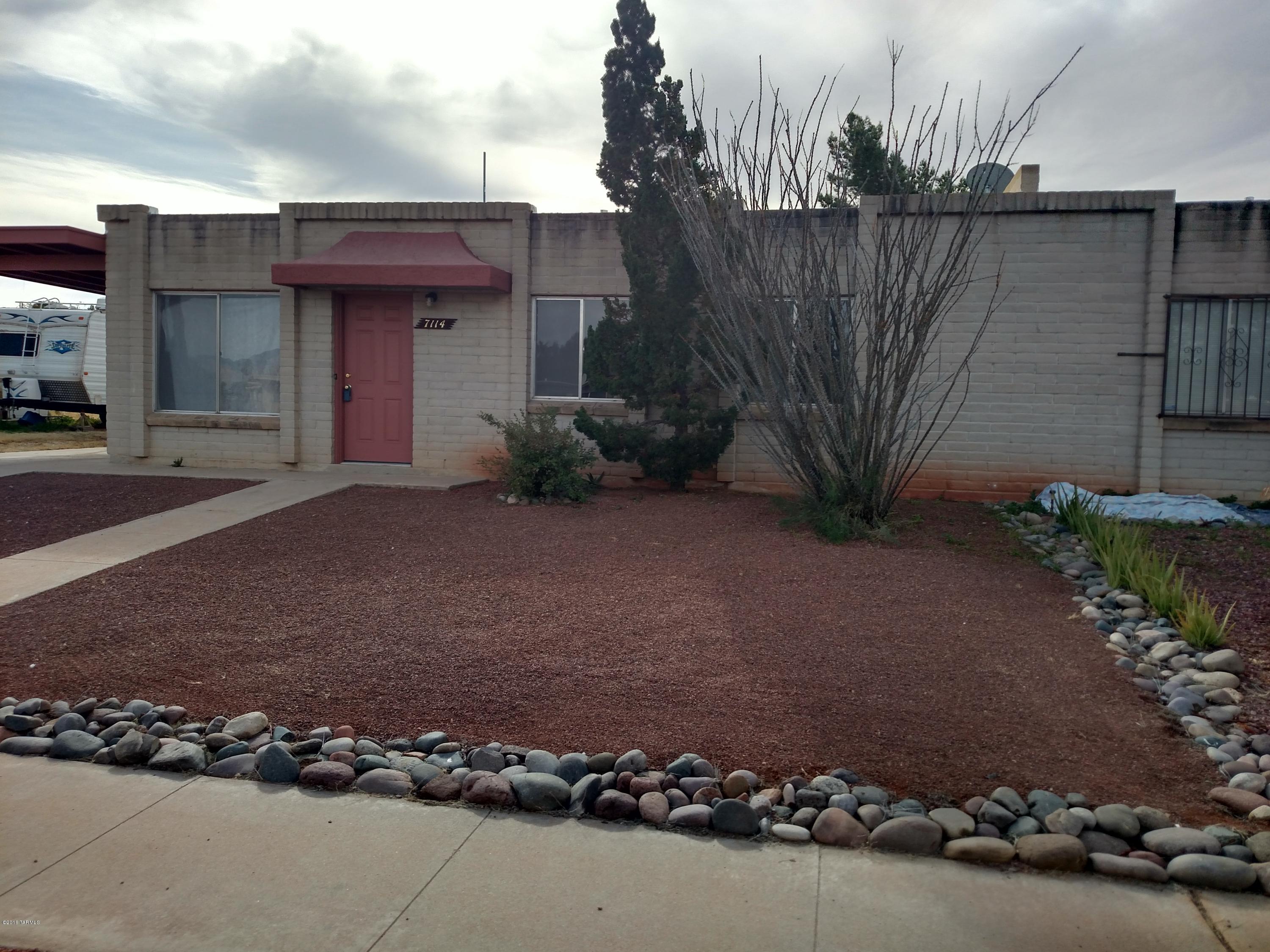 WONDERFUL TOWN HOME CLOSE TO JUST ABOUT EVERYTHING. WELL MAINTAINED HOME WITH ALL NEW 20'' PORCELAIN TILE FLOORING, A/C, 200 AMP SERVICE, GRANITE KITCHEN COUNTERS AND ALDER CABINETRY, SINK, SOME FIXTURES AND LIGHTING,INTERIOR PAINT, REAR EXTERIOR PAINT, REAR SLIDING DOOR. ROOF RE-COAT 10/2015. FAG HEATER AND WATER HEATER IN RECENT YEARS. LARGE REAR YARD WITH FRESH DECORATIVE ROCK. SEPARATE LAUNDRY ROOM/STORAGE/WORKSHOP.