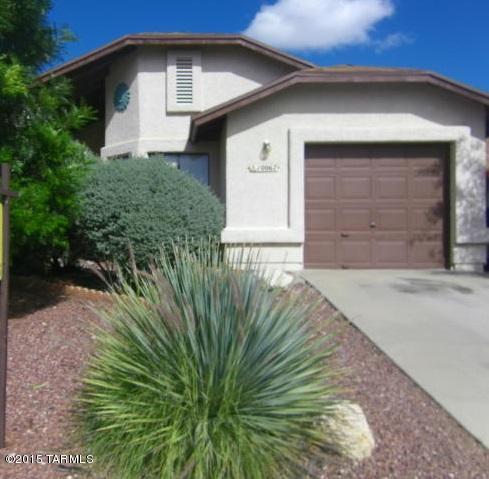 Move in ready. When I say move in ready I mean it. This is one of the cleanest homes I have ever listed. It has new inside paint, new tile in both baths, both in October 2015. New AC unit Dec 2014. It features three bedrooms, 1 full and one 3/4 bath, a living room, kitchen den, a good size master with walk in closet, ceiling fans, Plus a private North facing back yard, with large covered patio. It also features a community pool within walking distance and great Santa Rita Mountain Views. The seller has kept this property in pristine condition. Sit back and relax and watch great sunsets and twinkle lights from the front flag stone patio. Well run HOA to keep your investment on the rise.
It's tucked away in a cul-de-sac,has easy access to DMAFB, I-10, and Raytheon.