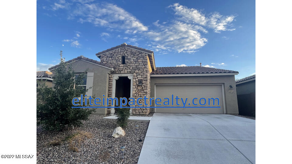 Home Sweet Home! Located in the Saguaro Trails Master Planned Community, this 3bed/2bath + office/den beauty is conveniently located minutes from DM, Raytheon, I-10 and in the Vail School District. You'll love the spacious open floor plan! Kitchen complete with granite counters, plenty of counter and cabinet space plus pantry, and island with breakfast bar. Primary Suite includes 2 walk-in closets, bathroom with dual vanities, and walk-in shower. 2nd and 3rd bedrooms are roomy too! Flex room can be used for office or den or whatever you choose. Beautifully landscaped back yard with covered patio and turf for easy care.  Laundry room with W/D hook ups. And enjoy all the amenities the fabulous neighborhood has to offer – Community Pool, Splash Pad, Dog Park, Walking/Biking Trails and more!