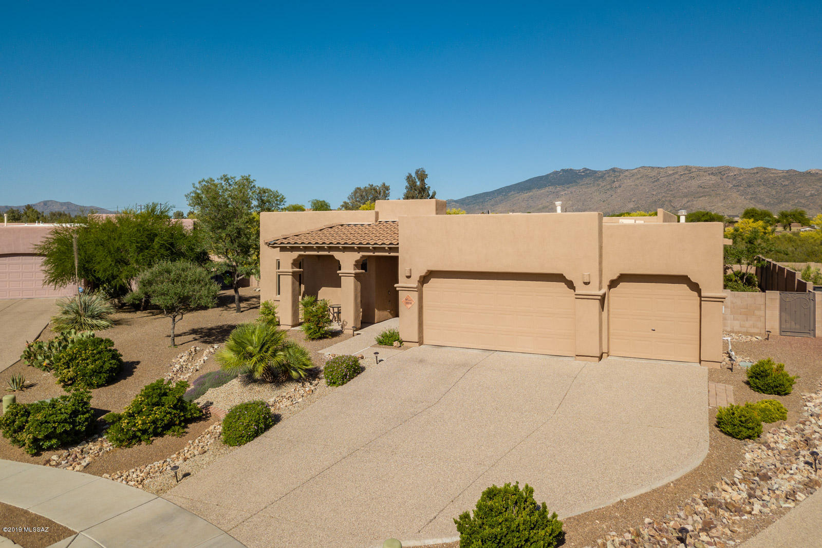 Pride of ownership is evident throughout this immaculate 3 bed + Den, 2 bathroom home. Great room floorplan is perfect for entertaining & provides room to spread out. Front entry flows into large living area, beautiful granite & stainless steel kitchen & dining area. Split bedroom plan has Large master suite w/ mountain views, large bathroom ,dual vanities, jetted tub & shower. Custom shelving allows for plenty of storage in generous walk in closet. Additional 2 bedrooms are nice sized w/ well appointed guest bathroom. Office/Den could also be used as playroom or extra living space. Large laundry room leads out to 3 car garage w/ plenty of storage space.  Backyard has multiple spaces to enjoy mountain views. Additional features: fully landscaped cul-de-sac lot, & aggregate driveway.