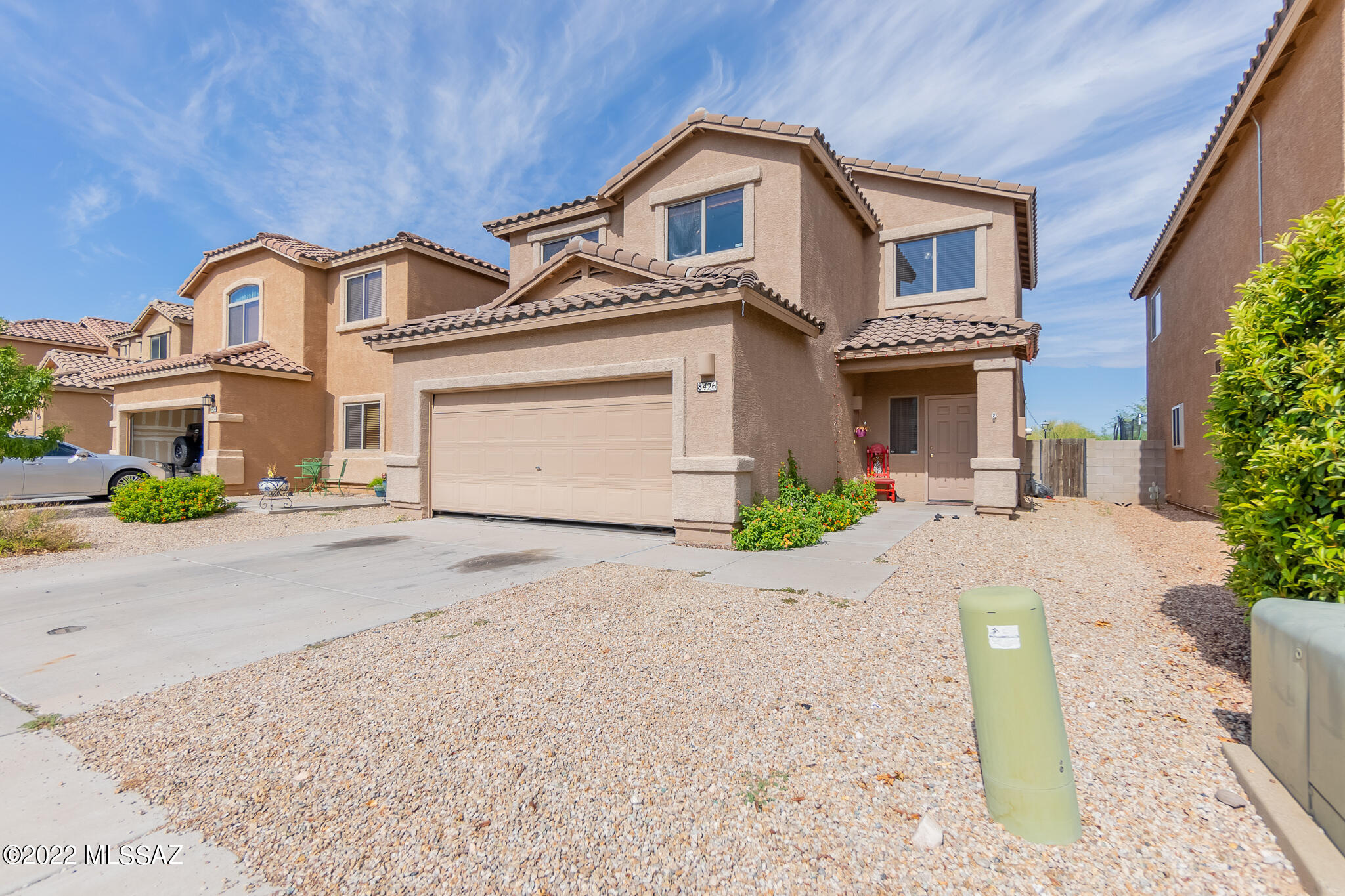 Welcome to this 3 bedroom 2.5 bathroom home located near shopping and in the vail school district. This 2 story home was built in 2007 and backs up to the common area that includes basketball court, grassy area, and community pool. The first floor includes large living room, dine in kitchen with island, powder room and the laundry room. Upstairs is a loft, 3 bedrooms and 2 full bathrooms. The front and backyard are low maintenance and have covered patios. Come put your personal touch and call this home.
