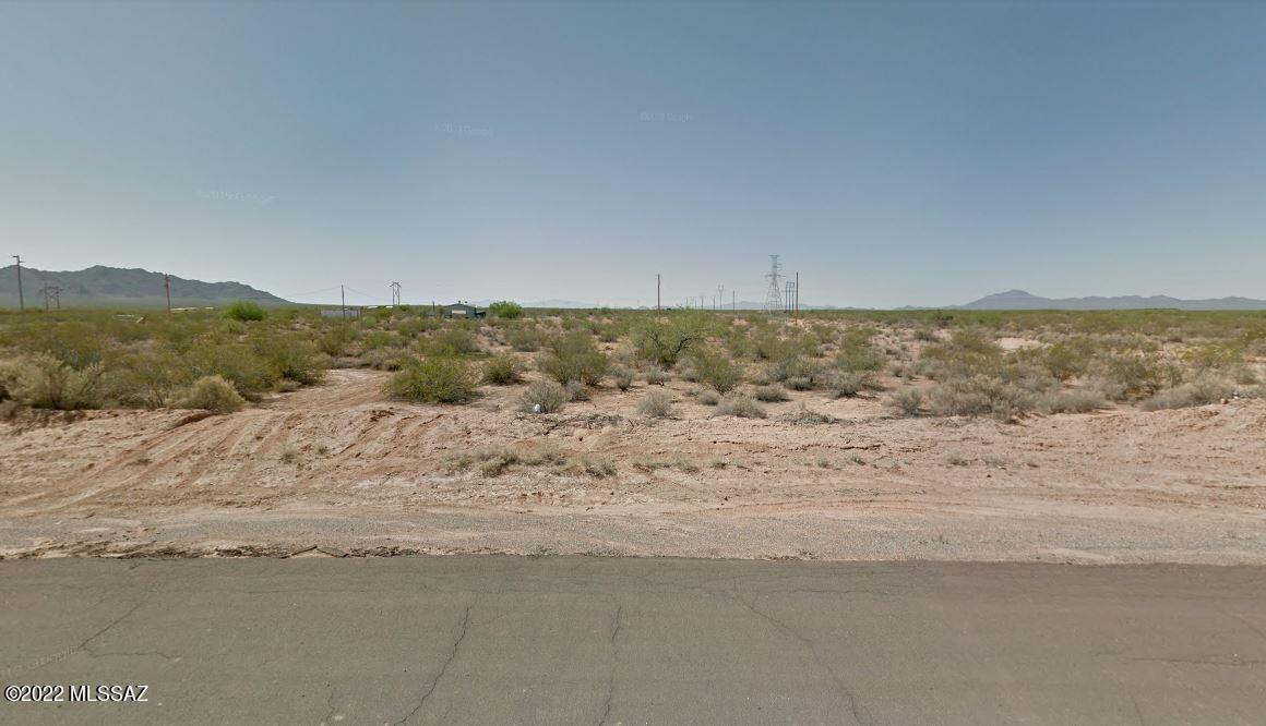 Surrounded by beautiful mountains...Sawtooth and Silver Bell. Bring in a manufactured home or build your own. Plenty of space to put up a barn and arena. Take a drive approximately 17 miles south of Arizona City. Enjoy Arizona's sunsets with the tranquility that is all around.