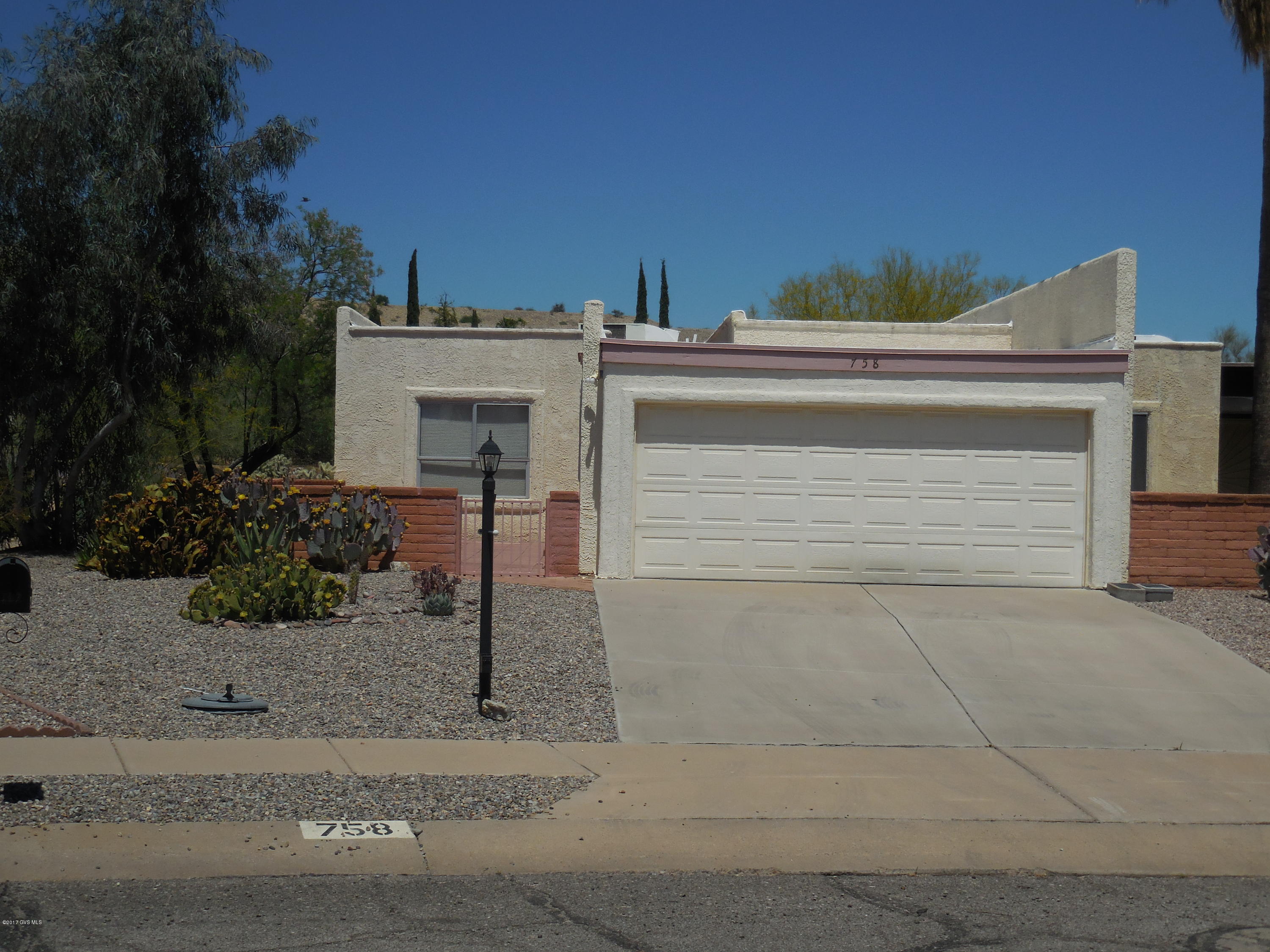 2 bedroom, 2 bath, 2 car garage in the popular Villages. NO GVR, but it is available. Lovely mountain view from the front patio. Nice floor plan. Furnishings can remain at no extra charge or they can be removed. Home needs TLC, but has so much potential. Wouldn't take much to have a show piece. Nice floor plan and great convenient location. Enjoy some or all the amenities such as walking trails, heated pool/hot tub, pickle ball, tennis and shuffleboard. Come take a look.