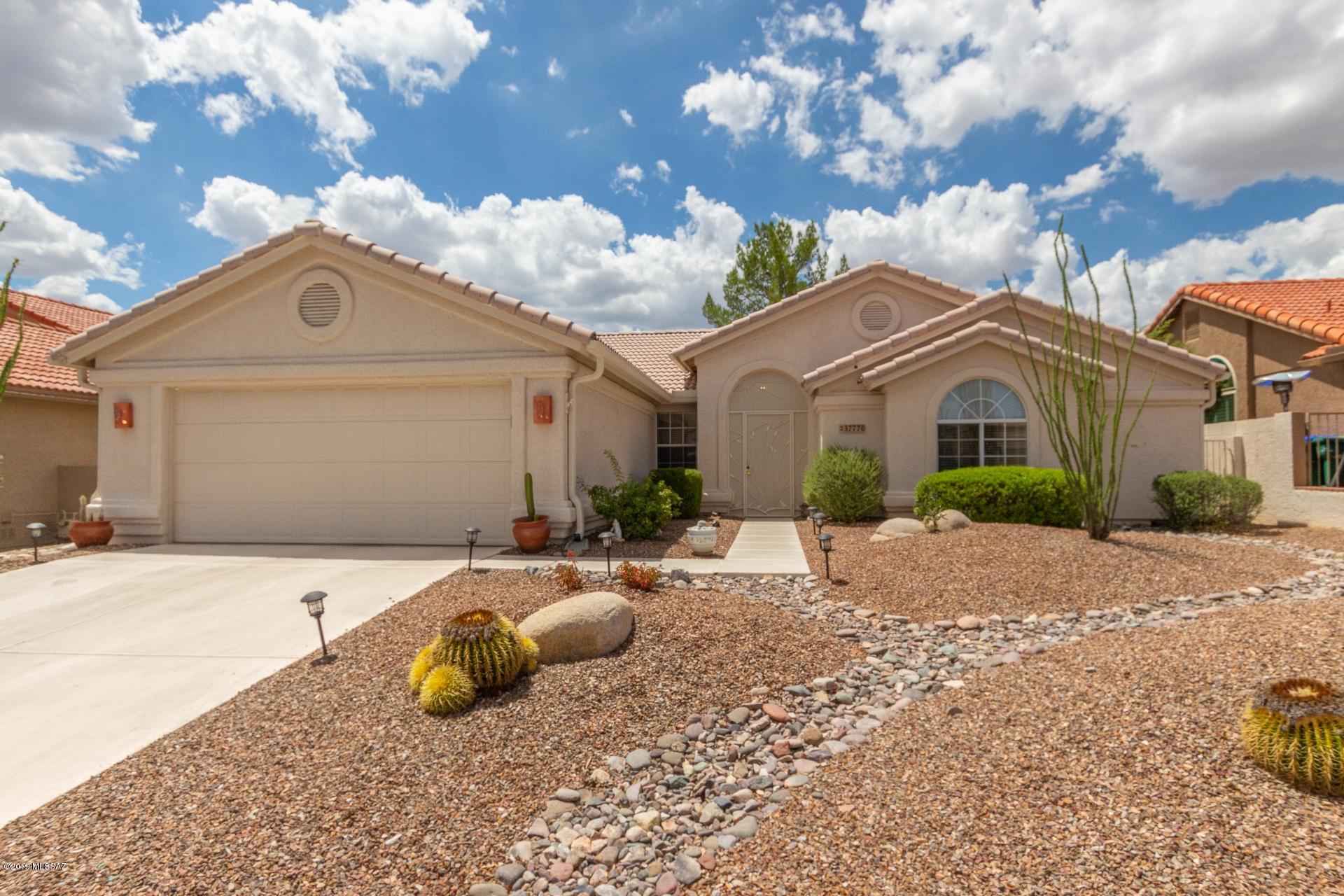 Located within walking distance of Saddlebrooke Clubhouse - come see this new to the market home today. 
The Extended brick patio is shaded with Citrus trees and with no neighbors behind you and natural desert views you have a very private backyard. Lots of storage cabinets in garage and many new items NO POLY PIPES! Completely replumbed in 2018, new dishwasher in 2019 and new hot water heater in 2016.   Don't miss this fabulous new listing.