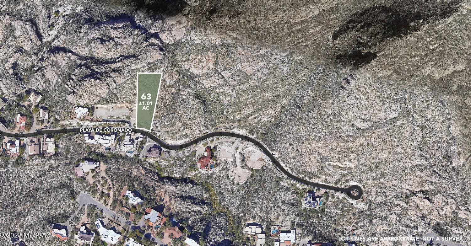 For sale in the ''ESTATES AT FINGER ROCK'', Lot 63 offers an exceptional opportunity. This gated community is renowned for its beauty and serenity in Tucson. In the northern foothills, this lot offers breathtaking views of both the cityscape and majestic mountains. The north side of the property borders the CORONADO NAT'L FOREST, providing a vast expanse of untouched natural beauty. Enjoy access to the popular hiking trails at Finger Rock. All essential utilities, readily available on the lot. The lot has a graded pad streamlining the construction process. Close proximity to fine dining and shopping destinations. Families will appreciate the top-tier CATALINA FOOTHILLS SCHOOL DISTRICT, known for its educational excellence. See virtual tour for a birds eye view.