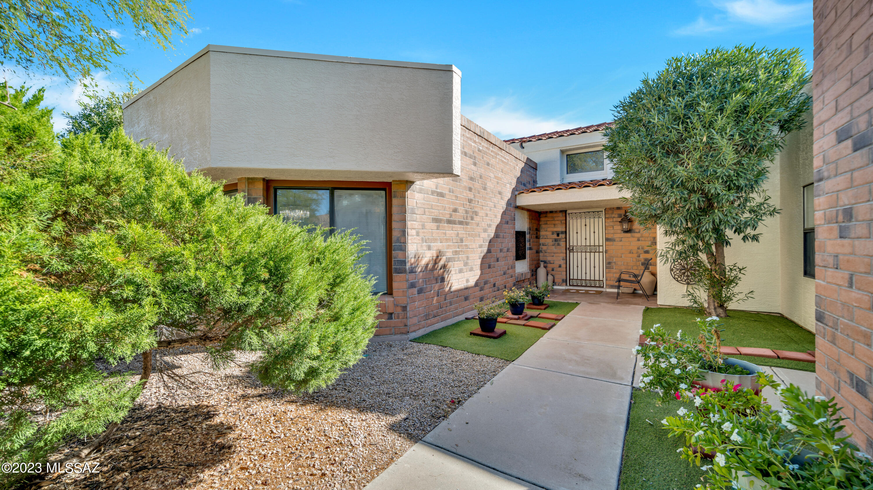 Fabulous MOUNTAIN VIEWS from main rooms, the back patio and large yard.  As you drive toward the property you will notice how quiet it is in the area and on the street. You will be drawn to the view immediately upon entering the property.  There is something for everyone in this home.  It has a DARK ROOM for the photographer in the family and a superb kitchen for the chef.  Great indoor and outdoor entertaining spaces with a low HOA and NO GVR.  This home is being sold partially furnished.