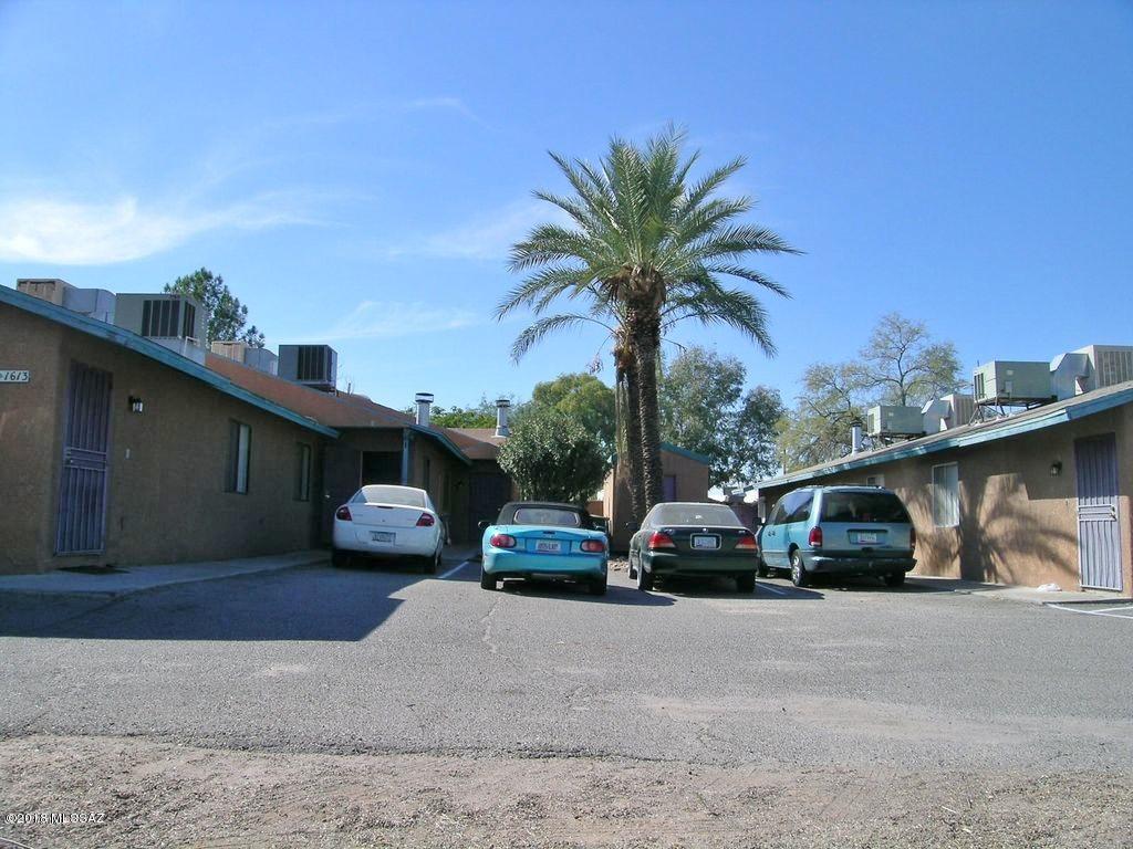 Five units on two separate parcels (one triplex and one duplex) sharing a common courtyard. Large units with four 3/2 floor plans and one 2/2 floor plan. All units include W&D hook ups, private fenced covered patios, fire places, central AC/heat and off street parking. Package is attached under documents section.