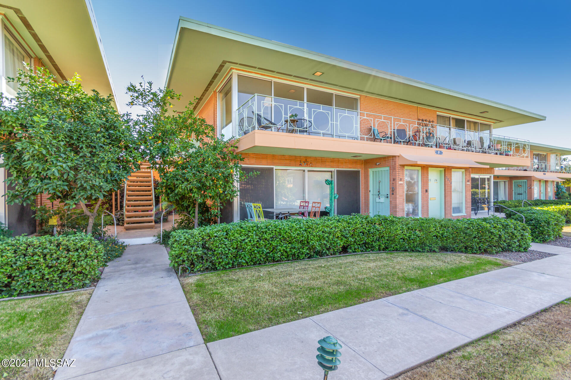 Location! Location! Location! Fantastic opportunity in the Historic Sam Hughes Villa Catalina Community. This 2nd story home is likely situated in the best location in the community. Inside boasts a stylish living room with a wall of windows overlooking the balcony to take in both the panoramic Catalina Mountain views and the lush mature landscaping below.  The spacious master bedroom features a huge private patio ideal for watching the twinkling stars or sipping your morning coffee. This Mid-Century Modern 55+ community is a Tucson icon. Designer of cooperative apartment buildings, Lionel Mayell designed the ''post-war garden apartment'' throughout the United States in the mid-1900s, including this complex in Tucson Arizona "This complex was focused on indoor-outdoor living and was added to the National Register of Historic Places in 1999." This style of design showcases floor to ceiling windows, exterior patios, colorful landscaping and shared amenities. Amenities featured on the property include two swimming pools, shuffleboard courts, built-in barbeques, putting green, meticulously maintained flora and fauna. Great opportunity to move into this community. HOA covers shared 2 car garage, utilities (electric, water); property taxes; insurance; maintenance for HVAC, water heater, and roof; valet trash pick-up; and grounds-keeping. Visit http://villacatalina.org to learn about this unique Tucson community!