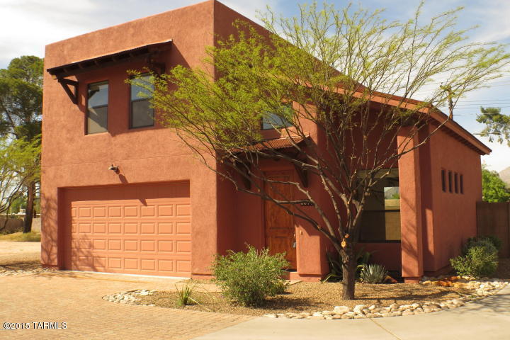 BUILT IN MED STUDENT TENANTS FOR 3 YEARS!! Beautiful Newer 4br/3Baths contemporary home in a Desirable central location cloe to UofA. Walk or bike to the Glenn bus line and bike path. Great room floorplan with high ceiling/ exposed modern duct work/ stained concrete floors. Granite counters and Cherry cabinets in kitchen.Large backyard with mountain views. Fantastic income property.