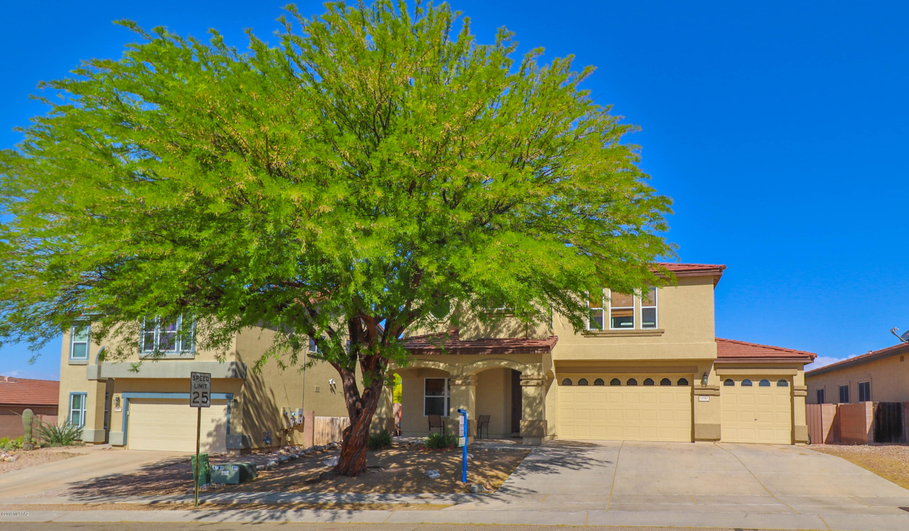 Beautifully maintained 2591 SF, 4 bedroom 3 bath home in highly desirable Rancho Del Lago!   Vail School district!  Home features 18 inch tile in all the wet areas and neutral paint through out!  Kitchen nicely appointed with tiled backsplash, stainless appliances, and island!  Huge walk in pantry/laundry room off of the kitchen!  Upstairs features loft area with 4 bedrooms!   Big Master bedroom with dual vanities in the master bath!  Garden tub with tiled surround!  3 car garage!  Resort like back yard features huge covered patio and sparkling pool with waterfall.  Will not last long!  Schedule your showing today!!!!!