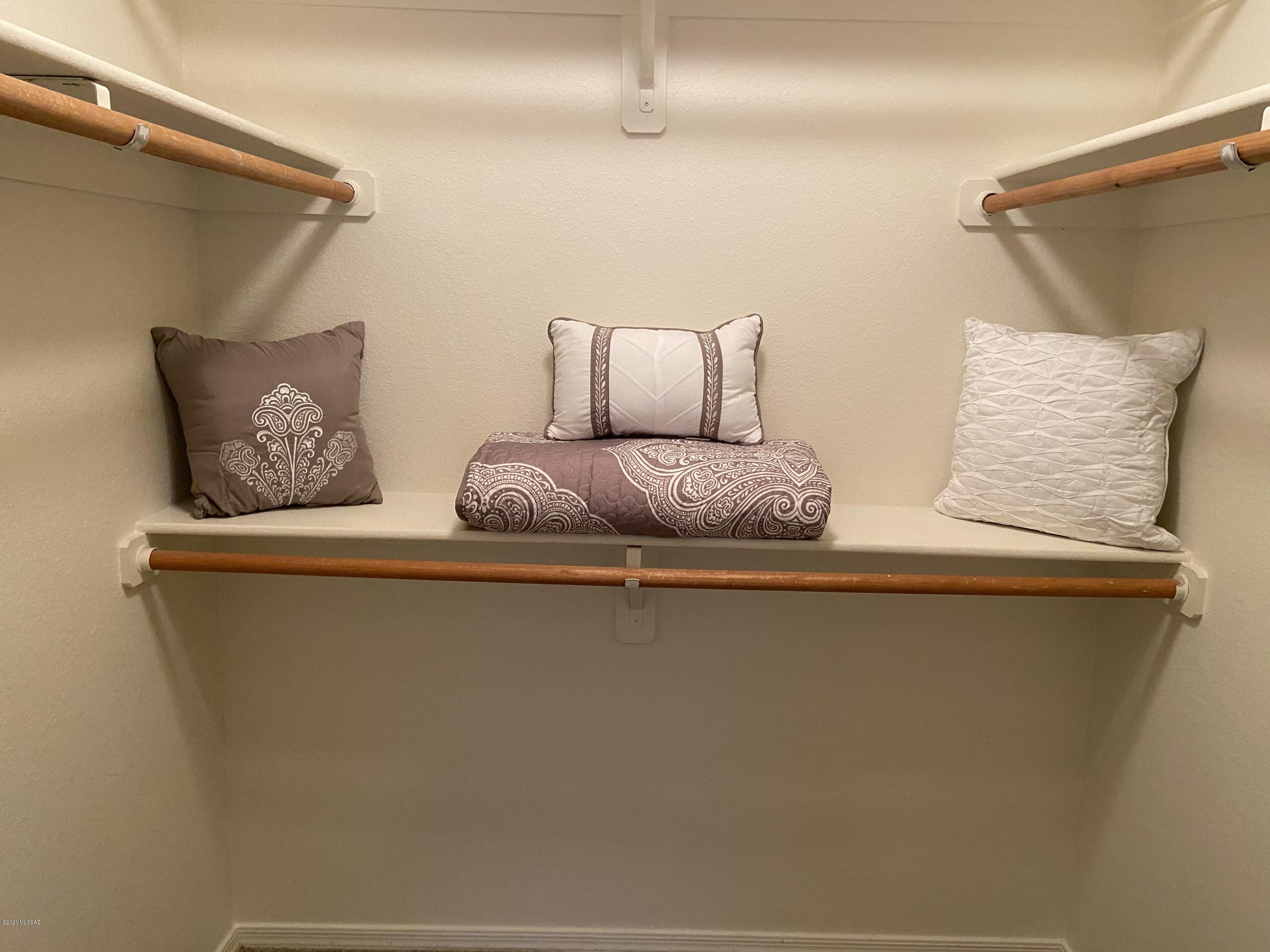 No ''admin'' fees, rental price is the rental price! Upstairs one bedroom over looking main pool area with lots of trees for private feel to patio. This gem has a walk in closet with lots of storage inside and good storage on patio. Comes with all kitchen appliance's with full size washer and dryer, large pantry off of kitchen. Ceiling fans in living room and bedroom, plus open bedroom window to enjoy water sounds from pool. Condo is all electric and comes with one covered parking space.
